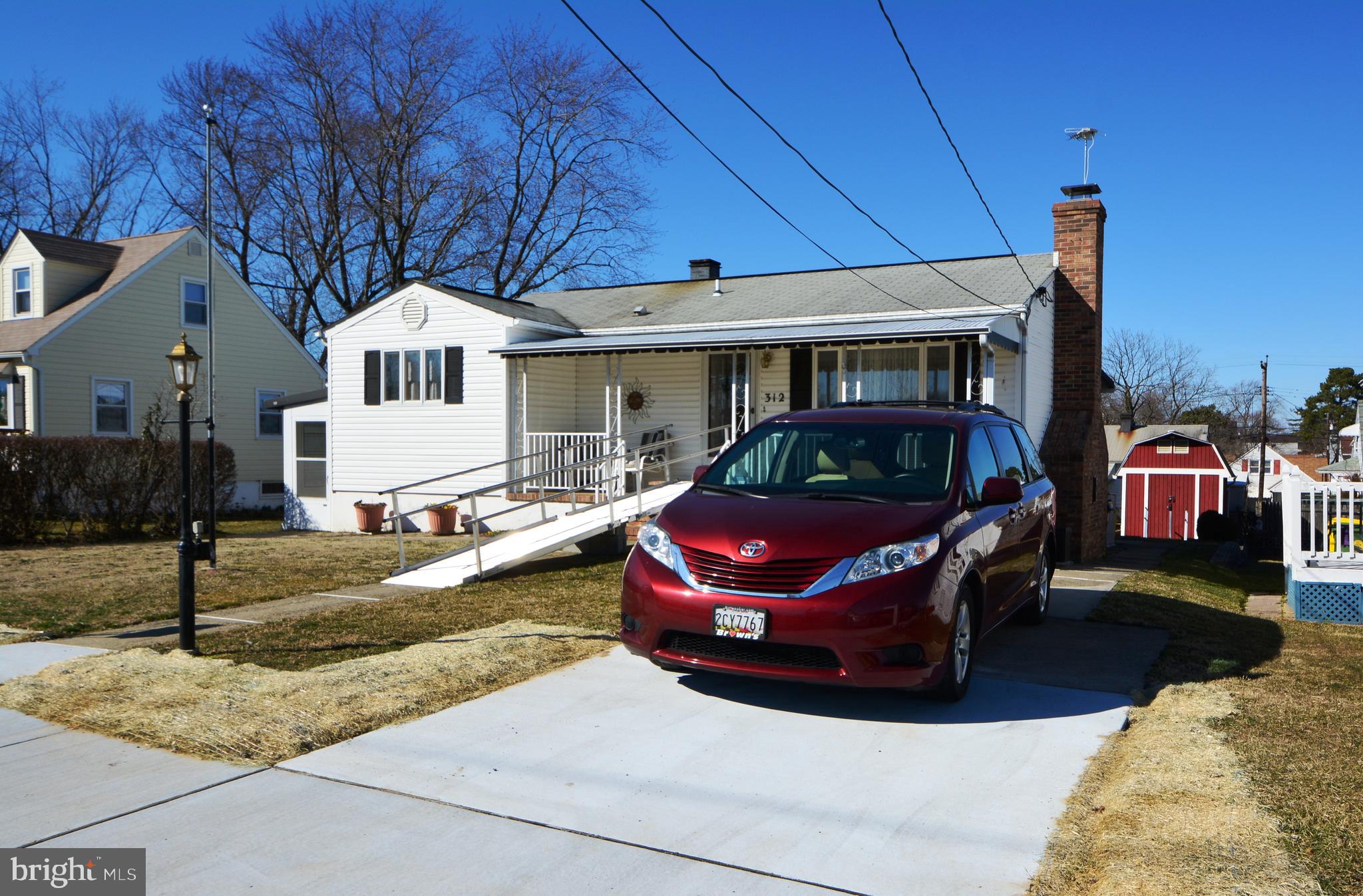 312 Holy Cross Road Baltimore, MD 21225 - Photo 62 of 68 Driveway, concrete parking pad