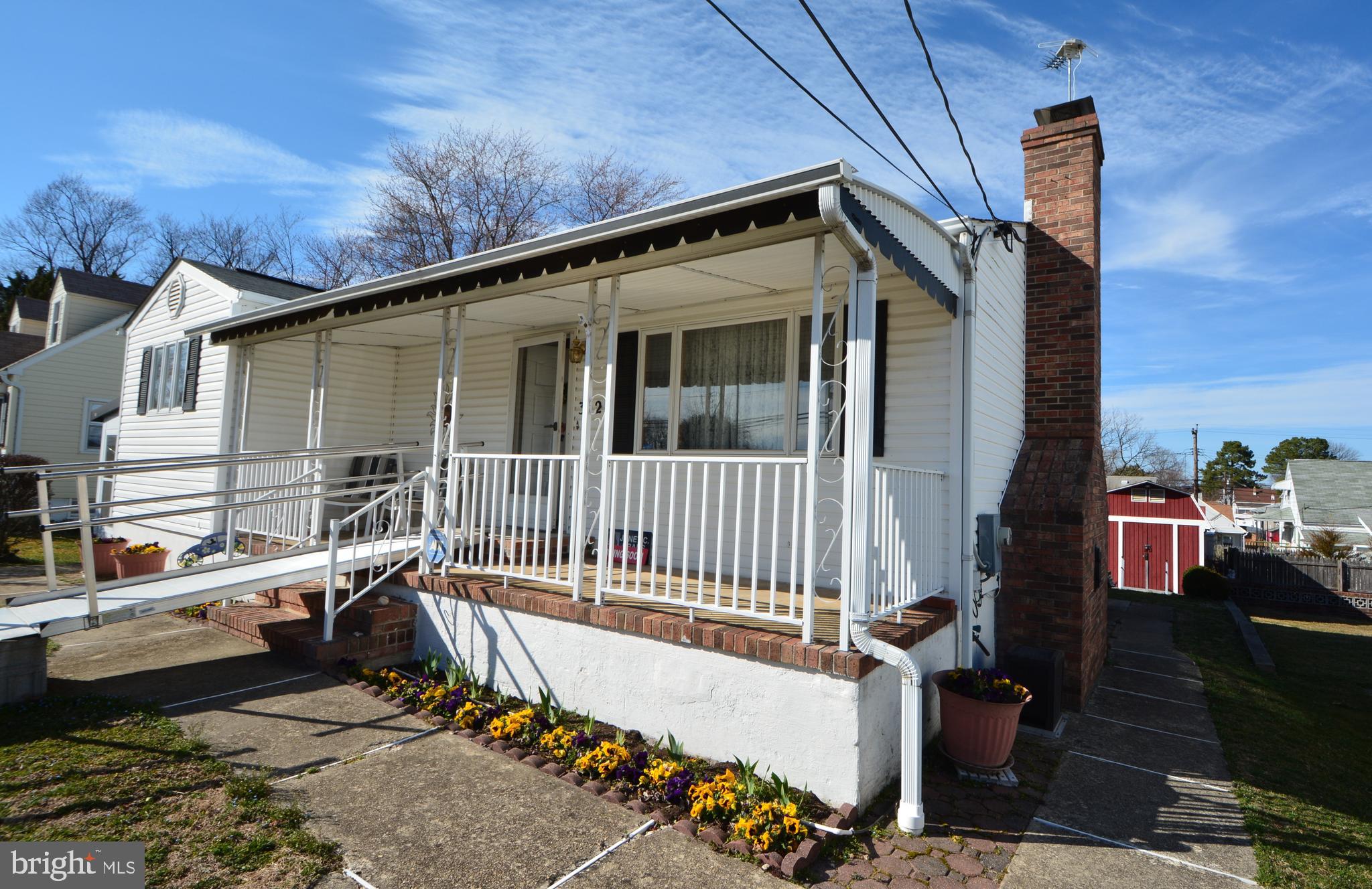 312 Holy Cross Road Baltimore, MD 21225 - Photo 63 of 68 Front porch sittin!