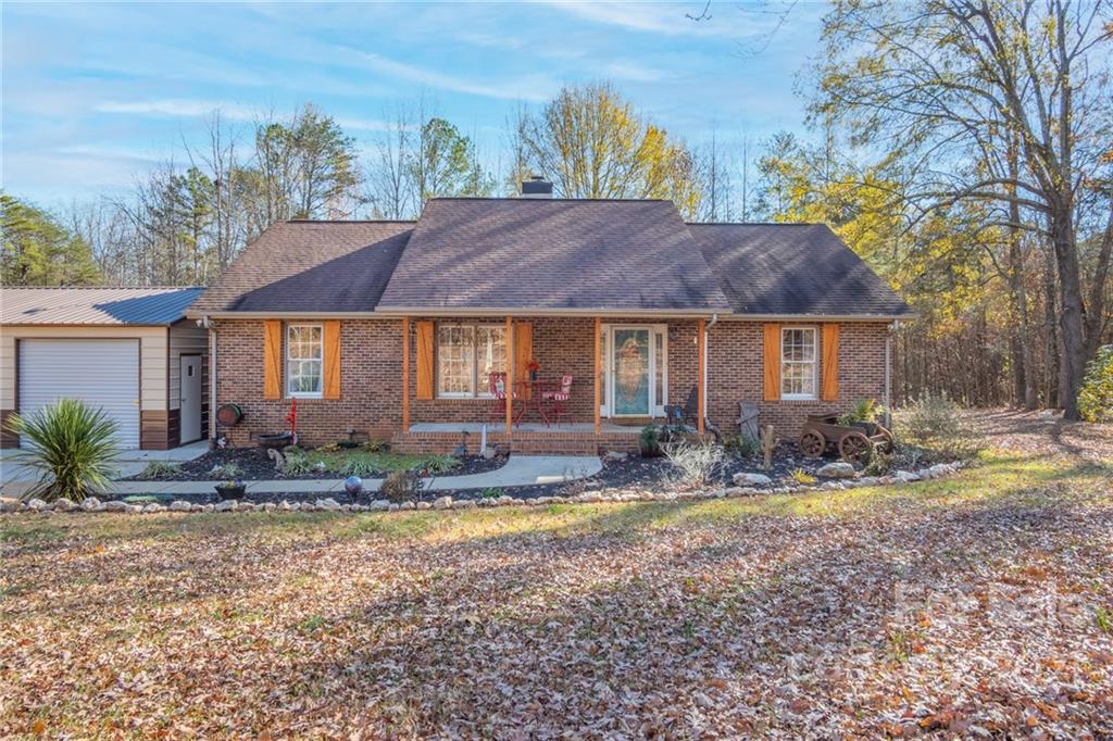 534 Sandifer Road York, SC 29745 - Photo 5 of 43 a front view of a house with garden