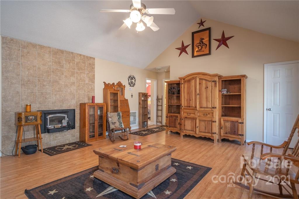 534 Sandifer Road York, SC 29745 - Photo 7 of 43 a living room with furniture a flat screen tv and a fireplace