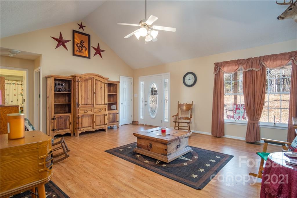 534 Sandifer Road York, SC 29745 - Photo 8 of 43 a living room with furniture gym equipment and a large window