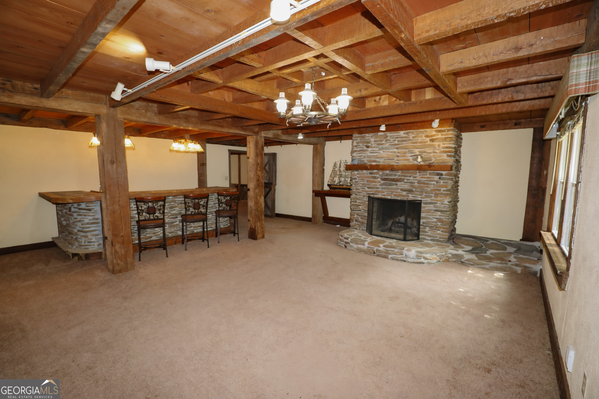 1017 Dr Bruce Jackson Road Newnan, GA 30263 - Photo 28 of 52 a view of a livingroom with furniture and a fireplace
