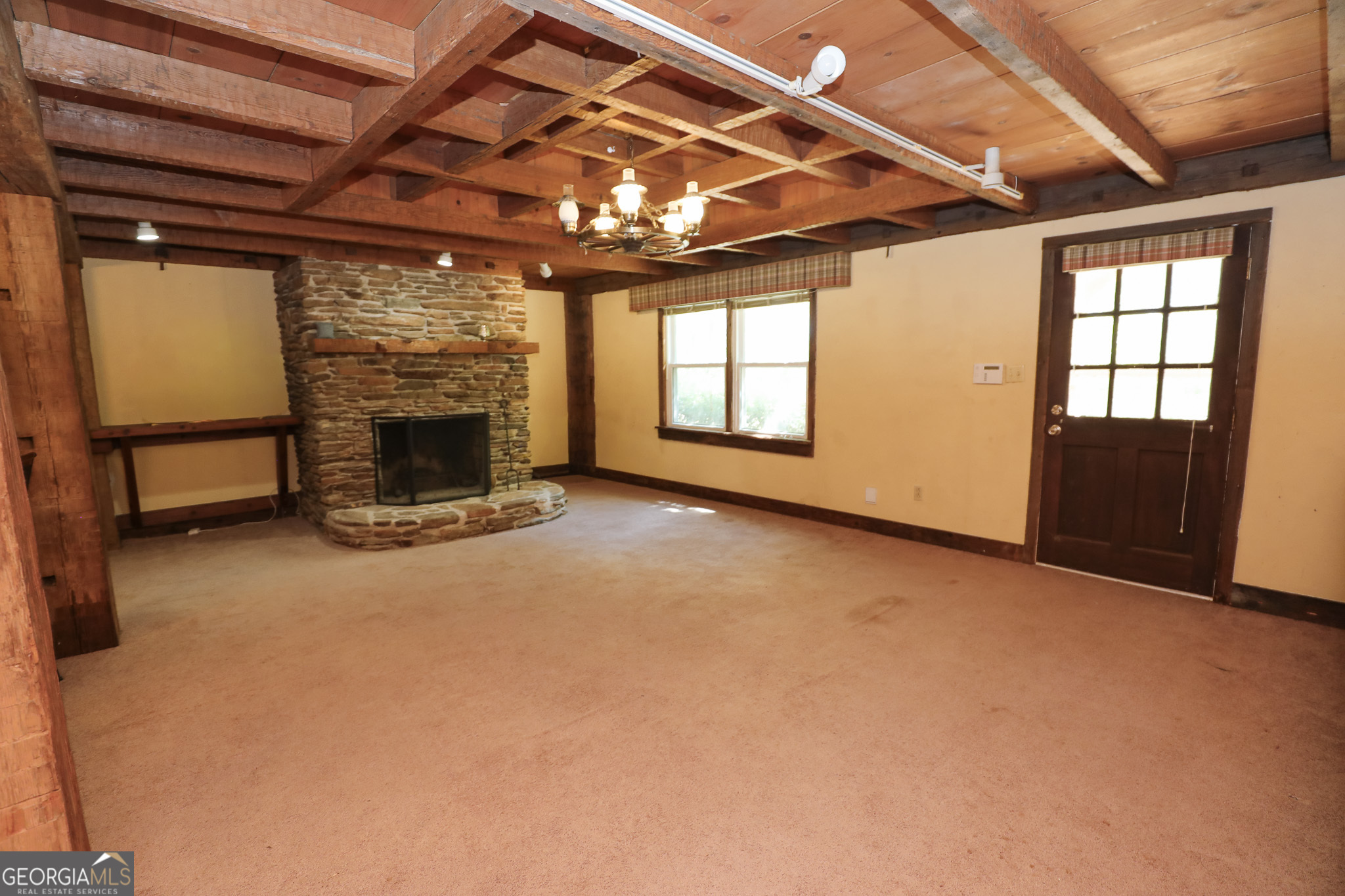 1017 Dr Bruce Jackson Road Newnan, GA 30263 - Photo 29 of 52 a view of empty room with a fireplace