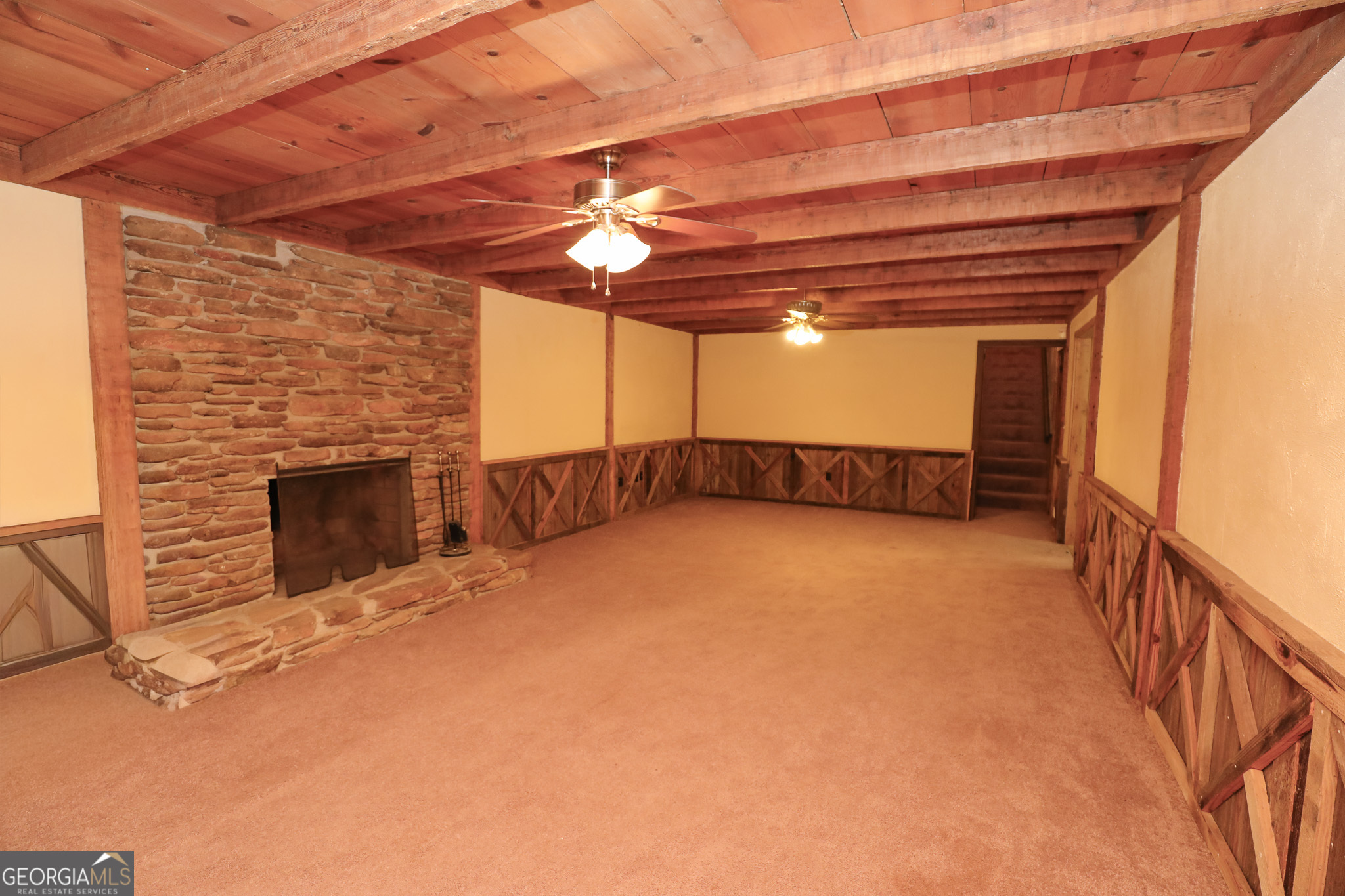 1017 Dr Bruce Jackson Road Newnan, GA 30263 - Photo 32 of 52 a view of an empty room with a fireplace