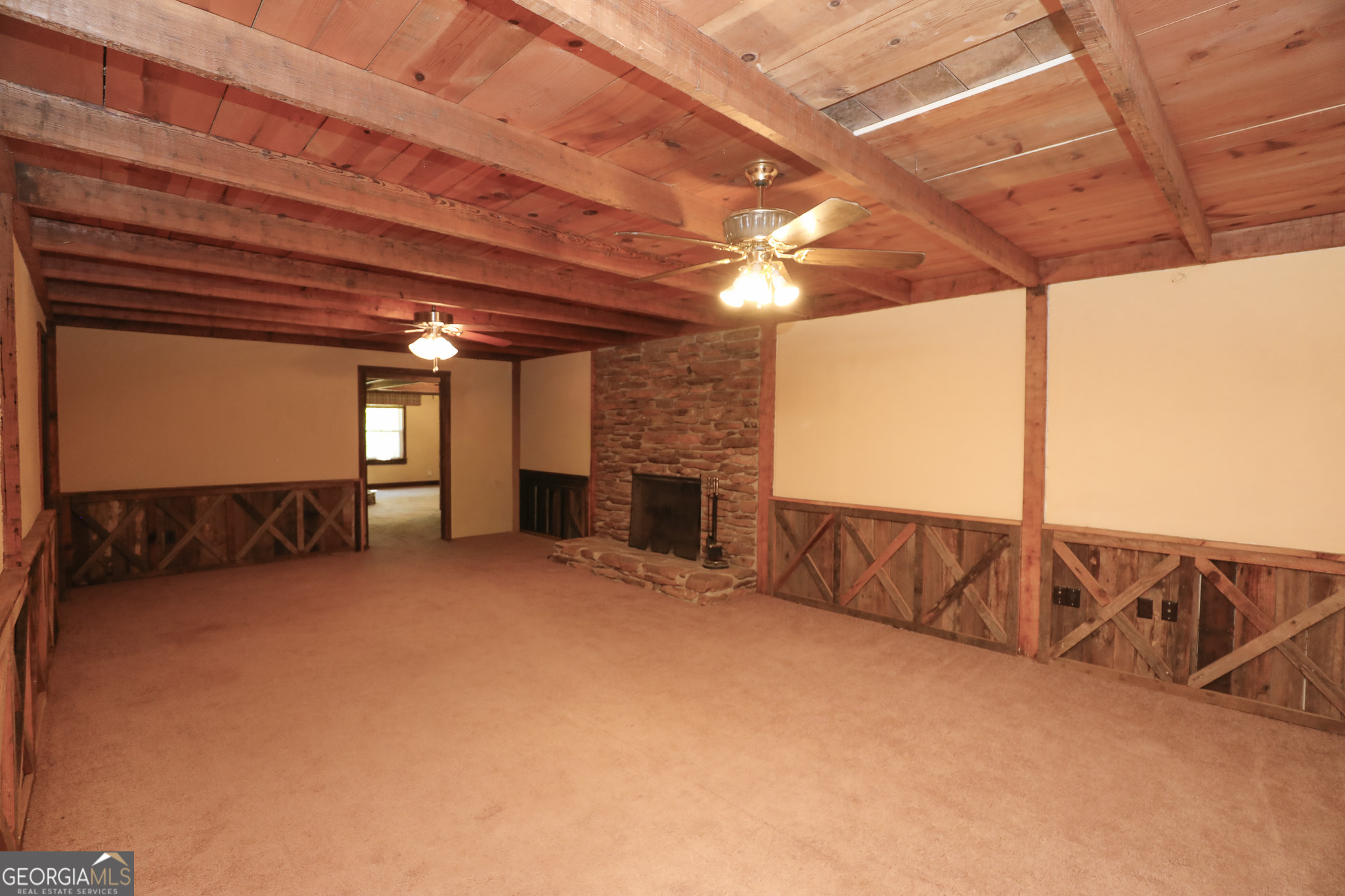 1017 Dr Bruce Jackson Road Newnan, GA 30263 - Photo 33 of 52 a view of a room with furniture and a fireplace