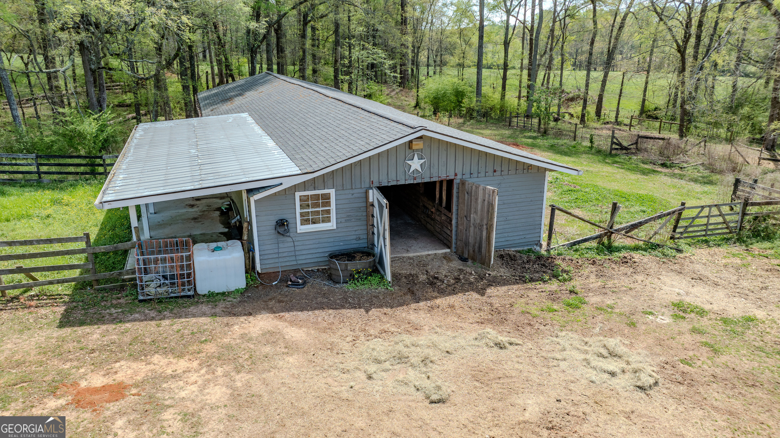 1017 Dr Bruce Jackson Road Newnan, GA 30263 - Photo 43 of 52 a house view with a backyard space