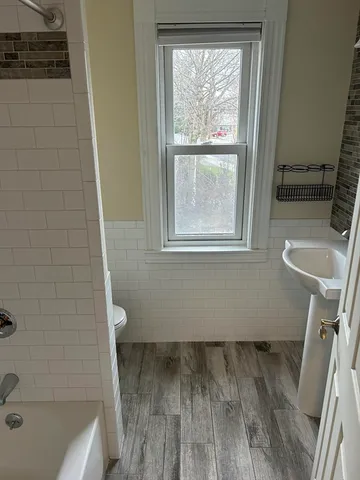 a bathroom with a sink and a toilet