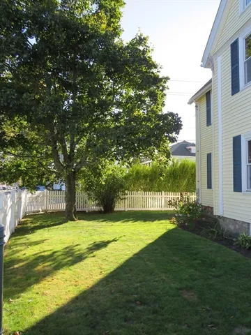 a view of a backyard with a garden