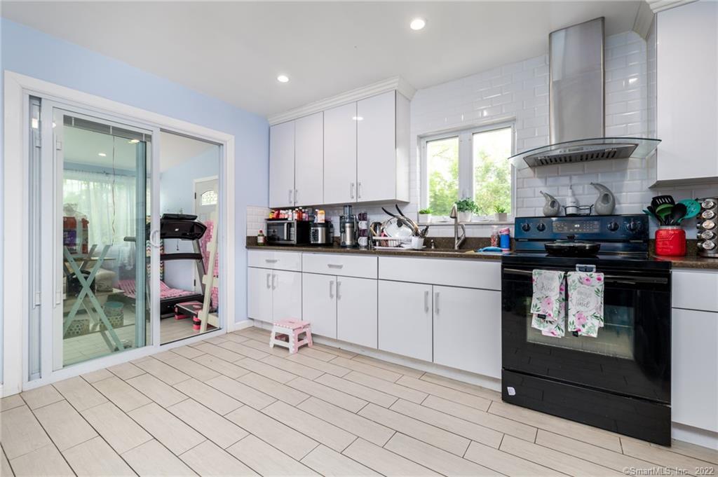 21 Hirsch Road Stamford, CT 06905 - Photo 8 of 37 1st Fl Kitchen with view of sunroom