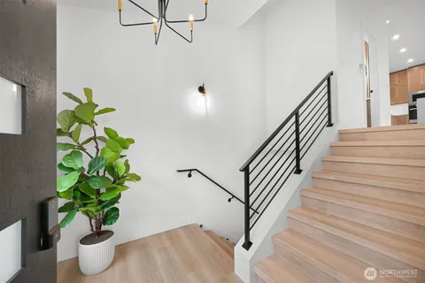 a view of entryway with wooden floor