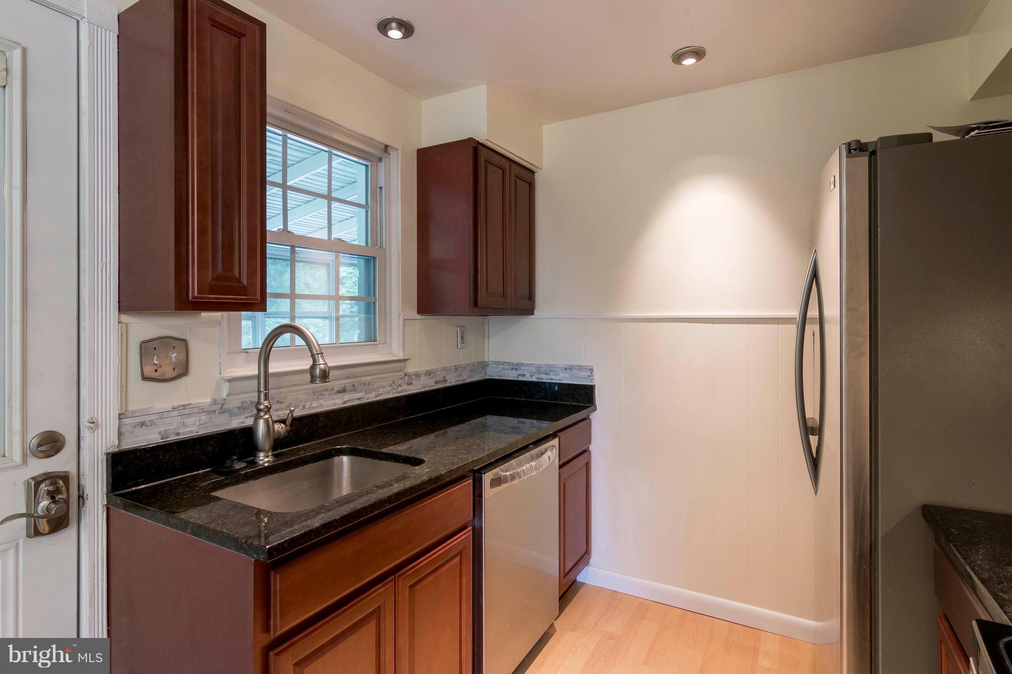 610 McHenry Road Baltimore, MD 21208 - Photo 12 of 27 Stainless appliances and granite counters