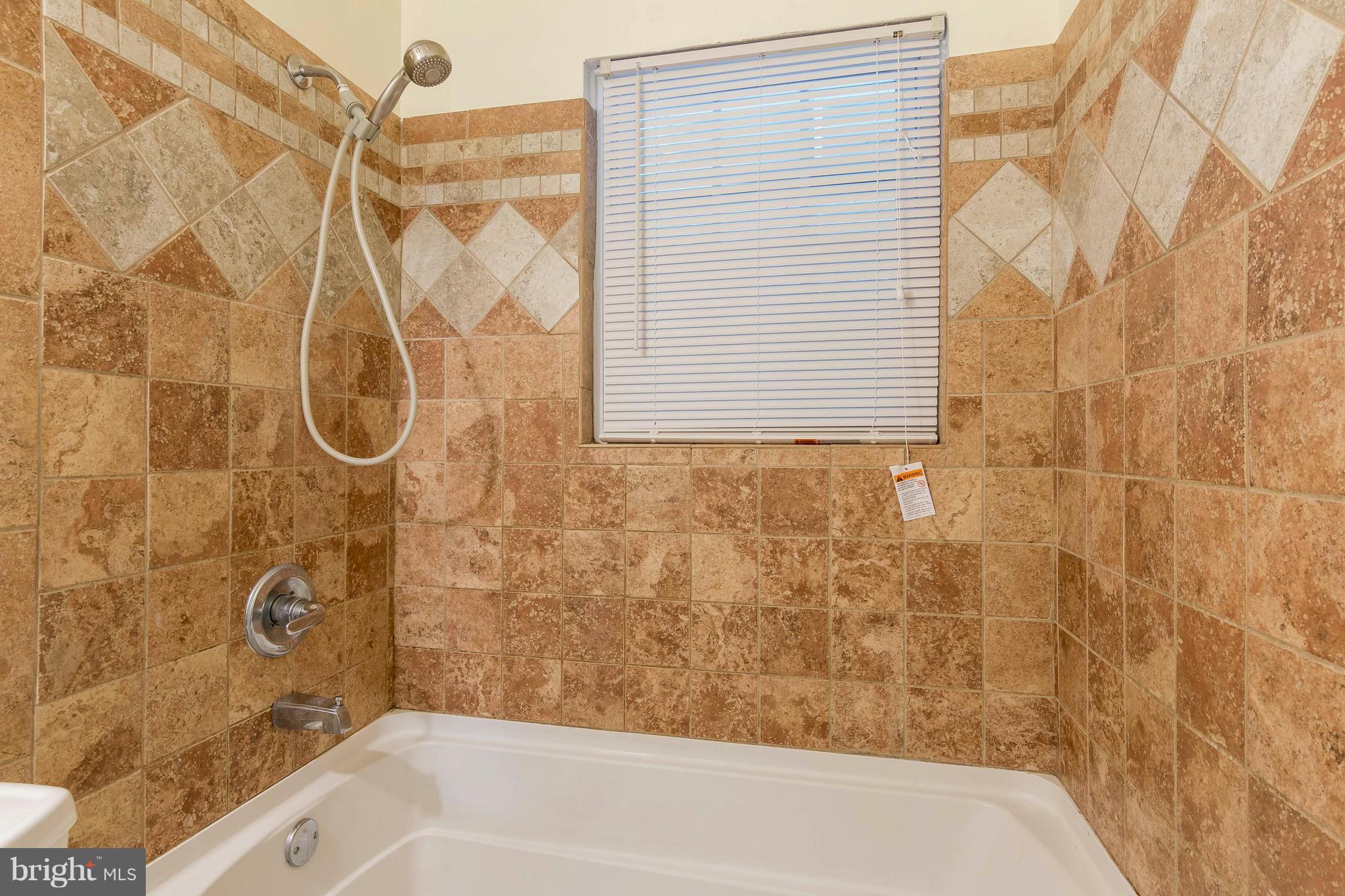 610 McHenry Road Baltimore, MD 21208 - Photo 15 of 27 Beautiful tile shower and floor