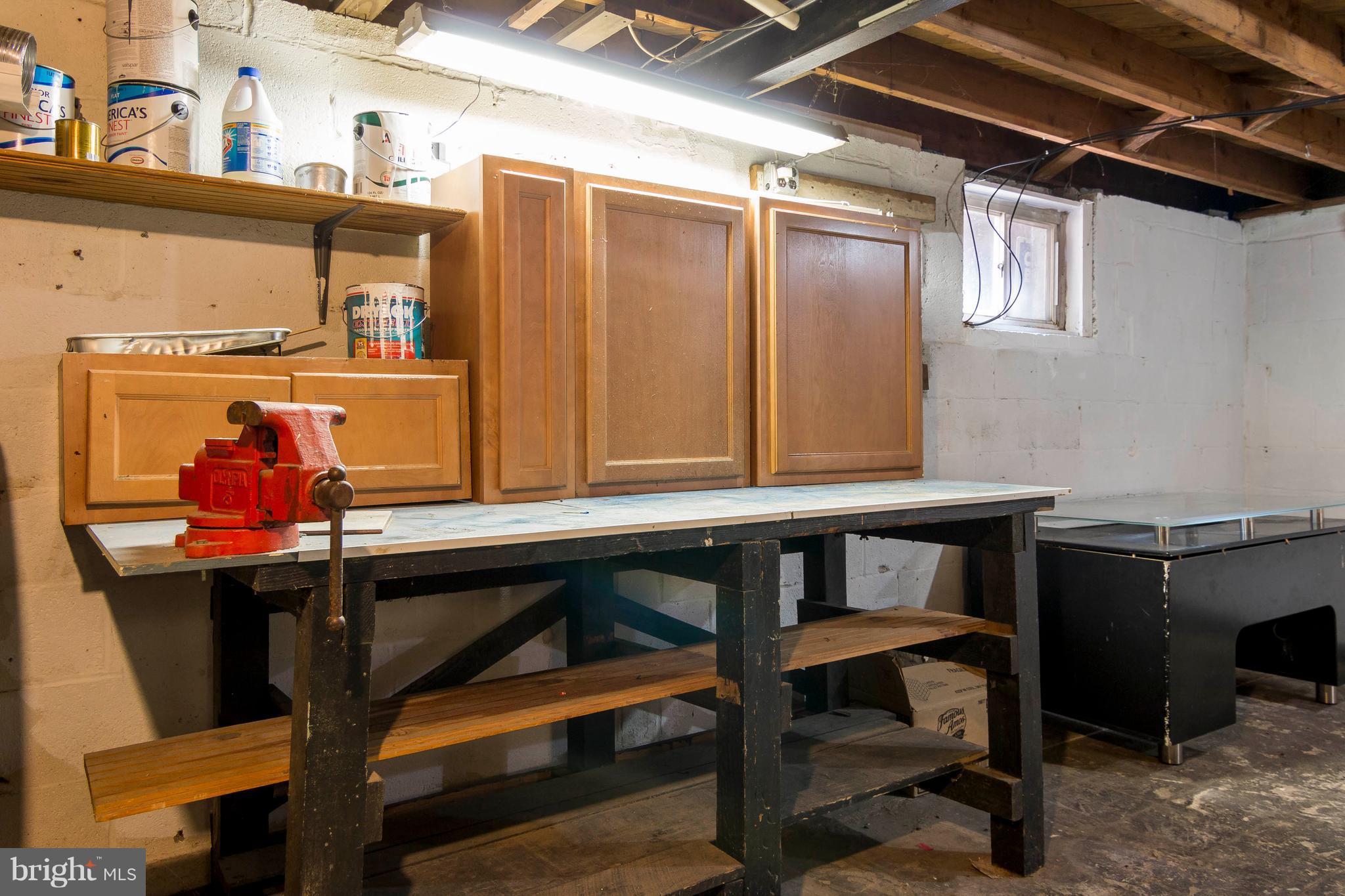 610 McHenry Road Baltimore, MD 21208 - Photo 24 of 27 Lower level workshop, utility room and storage