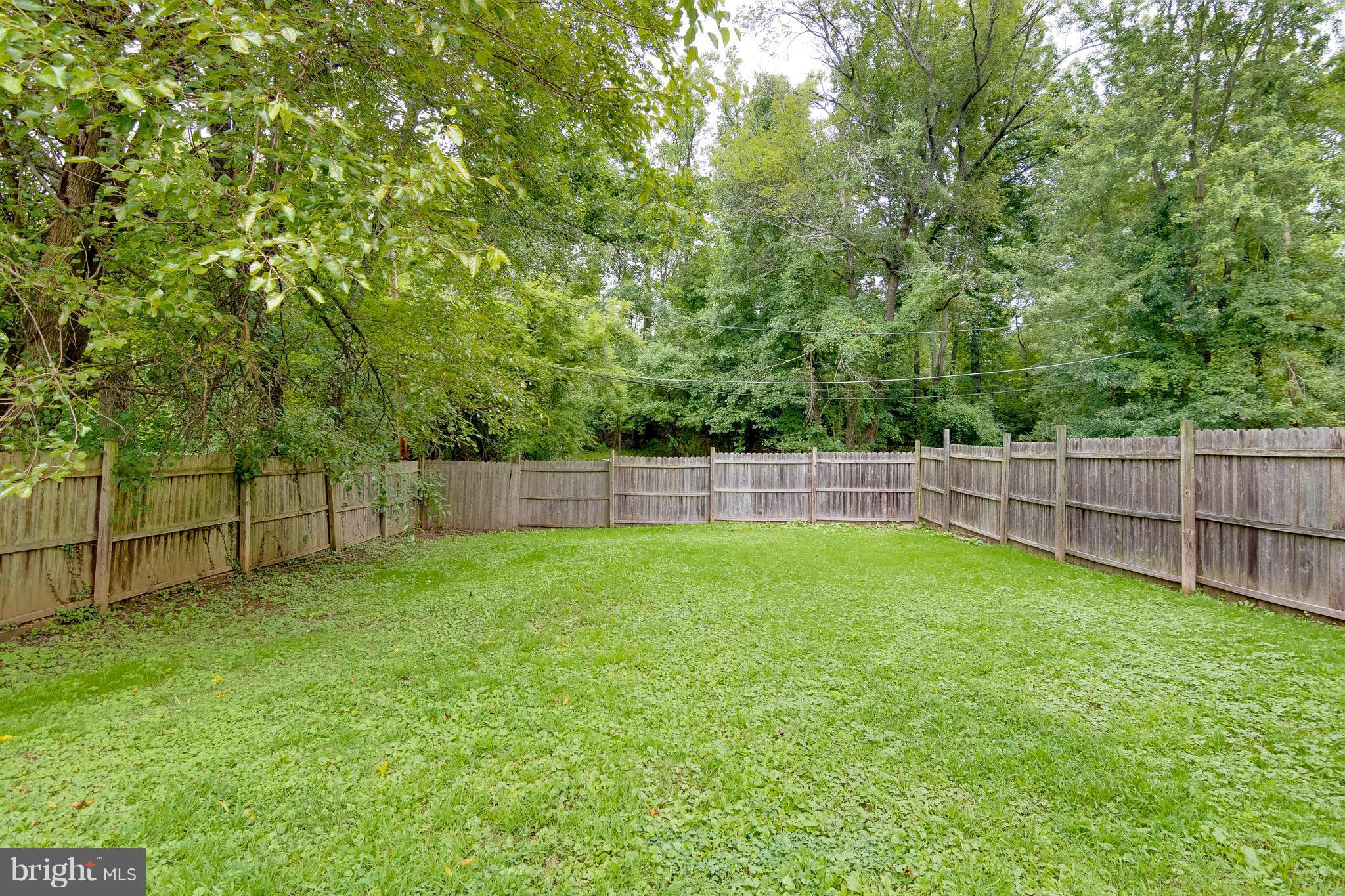 610 McHenry Road Baltimore, MD 21208 - Photo 5 of 27 Level fenced back yard