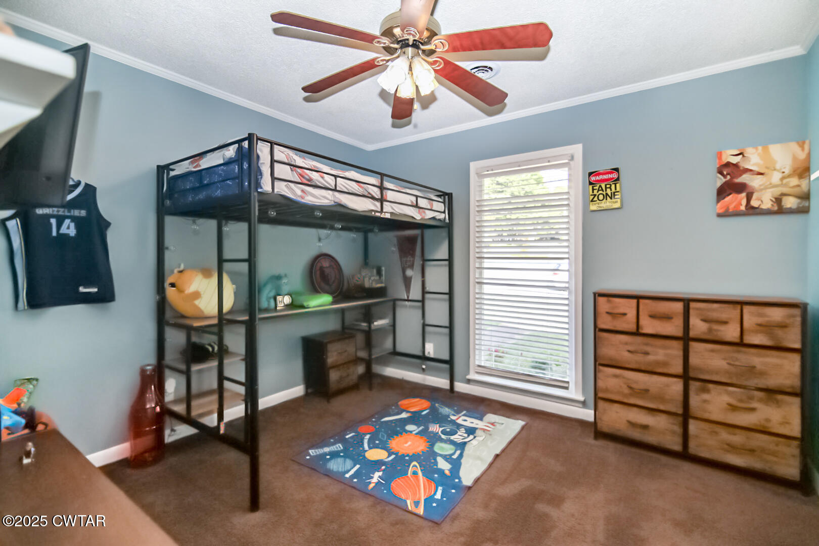 152 Whitfield Drive Jackson, TN 38305 - Photo 11 of 17 a bedroom with furniture and a window