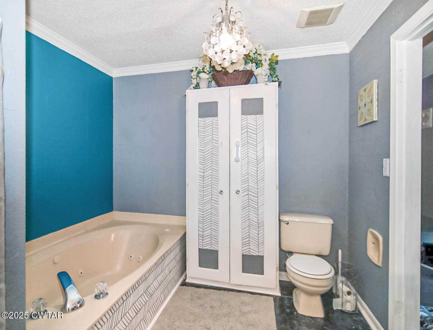 152 Whitfield Drive Jackson, TN 38305 - Photo 13 of 17 a bathroom with a granite countertop sink a toilet and shower