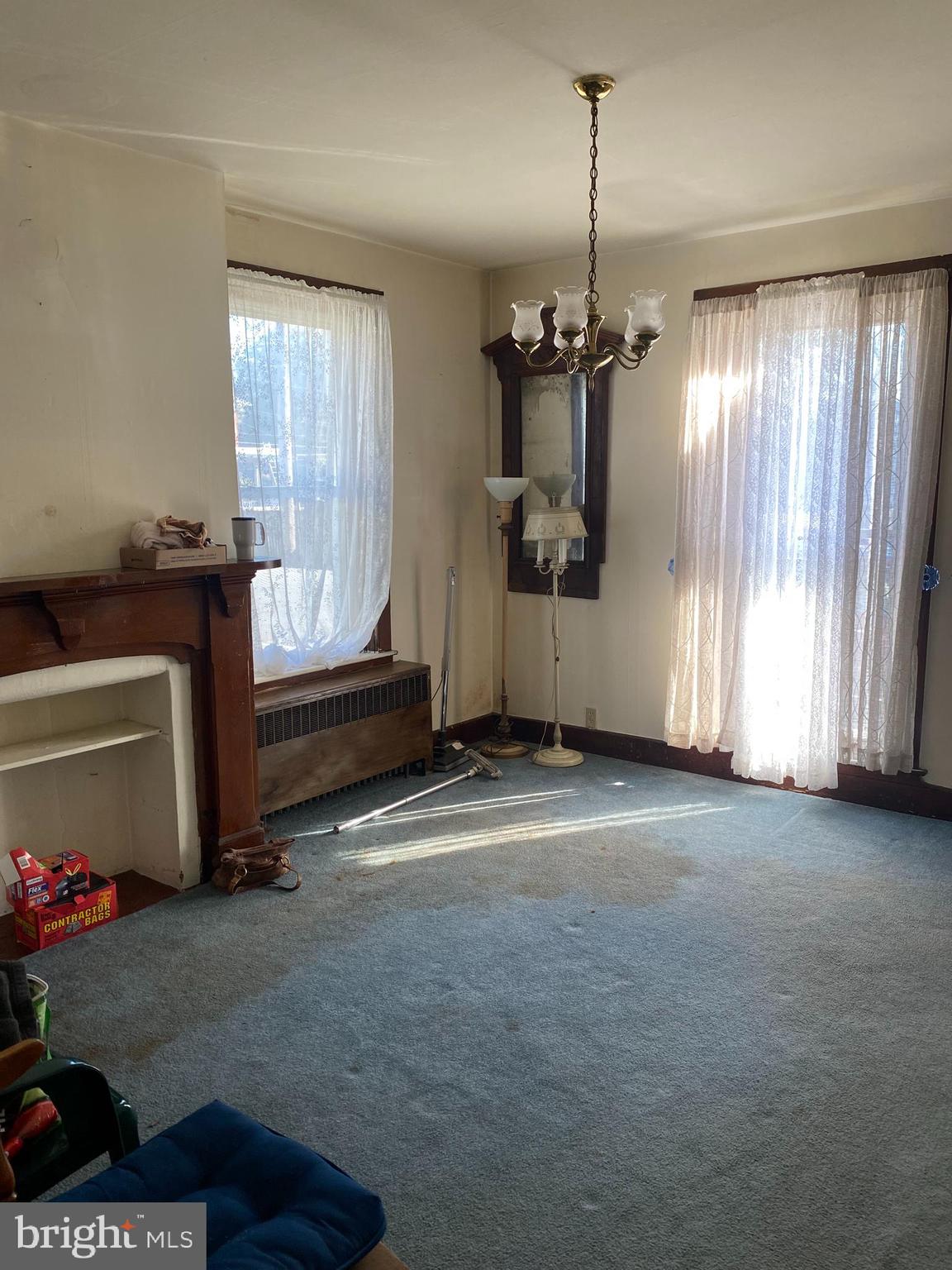 4 Whyte Street Union Bridge, MD 21791 - Photo 15 of 32 a view of livingroom with hardwood floor and a window