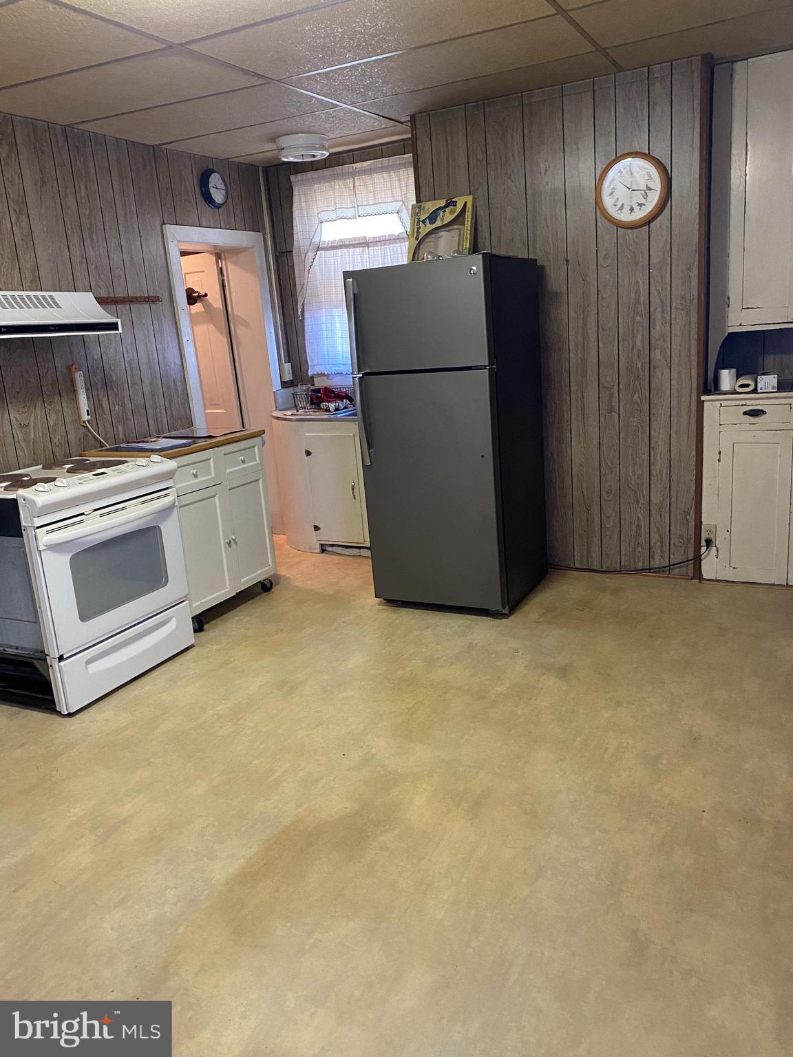 4 Whyte Street Union Bridge, MD 21791 - Photo 18 of 32 a kitchen with refrigerator and cabinets