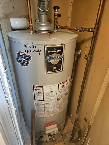 a bedroom with a bed and a mirror