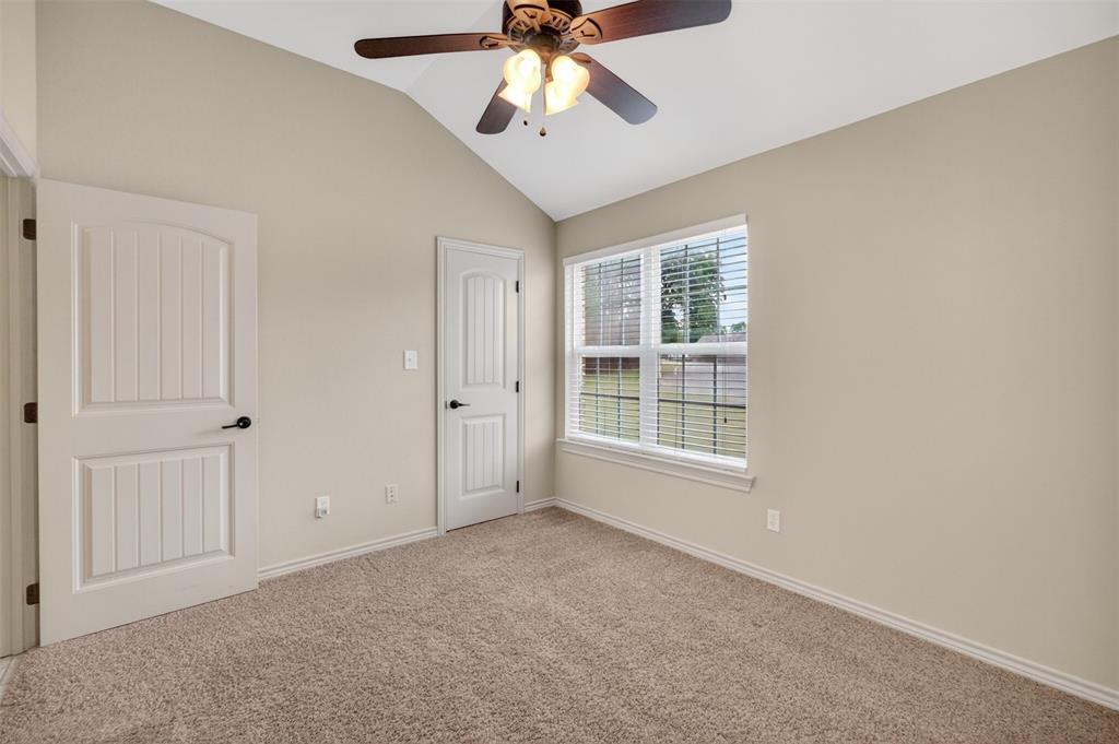 505 East 5th Street Springtown, TX 76082 - Photo 28 of 39 a view of an empty room with a window