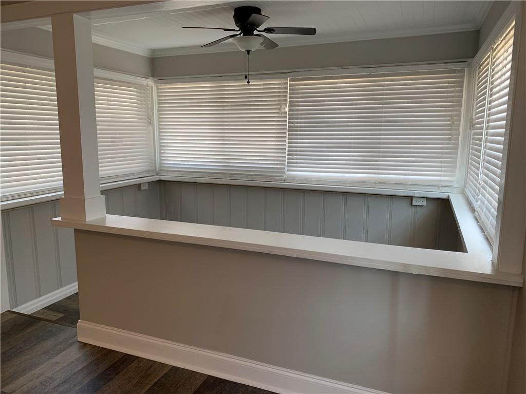 1261 Concord Road Southeast Smyrna, GA 30080 - Photo 7 of 50 an empty room with wooden floor