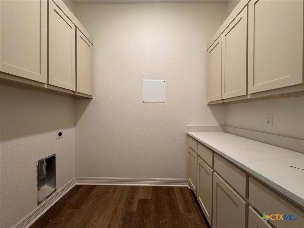 10712 Campsite Cove Temple, TX 76502 - Photo 10 of 11 a view of storage and utility room with wooden floor