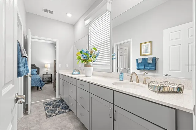 a white toilet sitting next to a bath tub