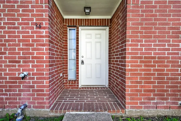 a view of a brick wall
