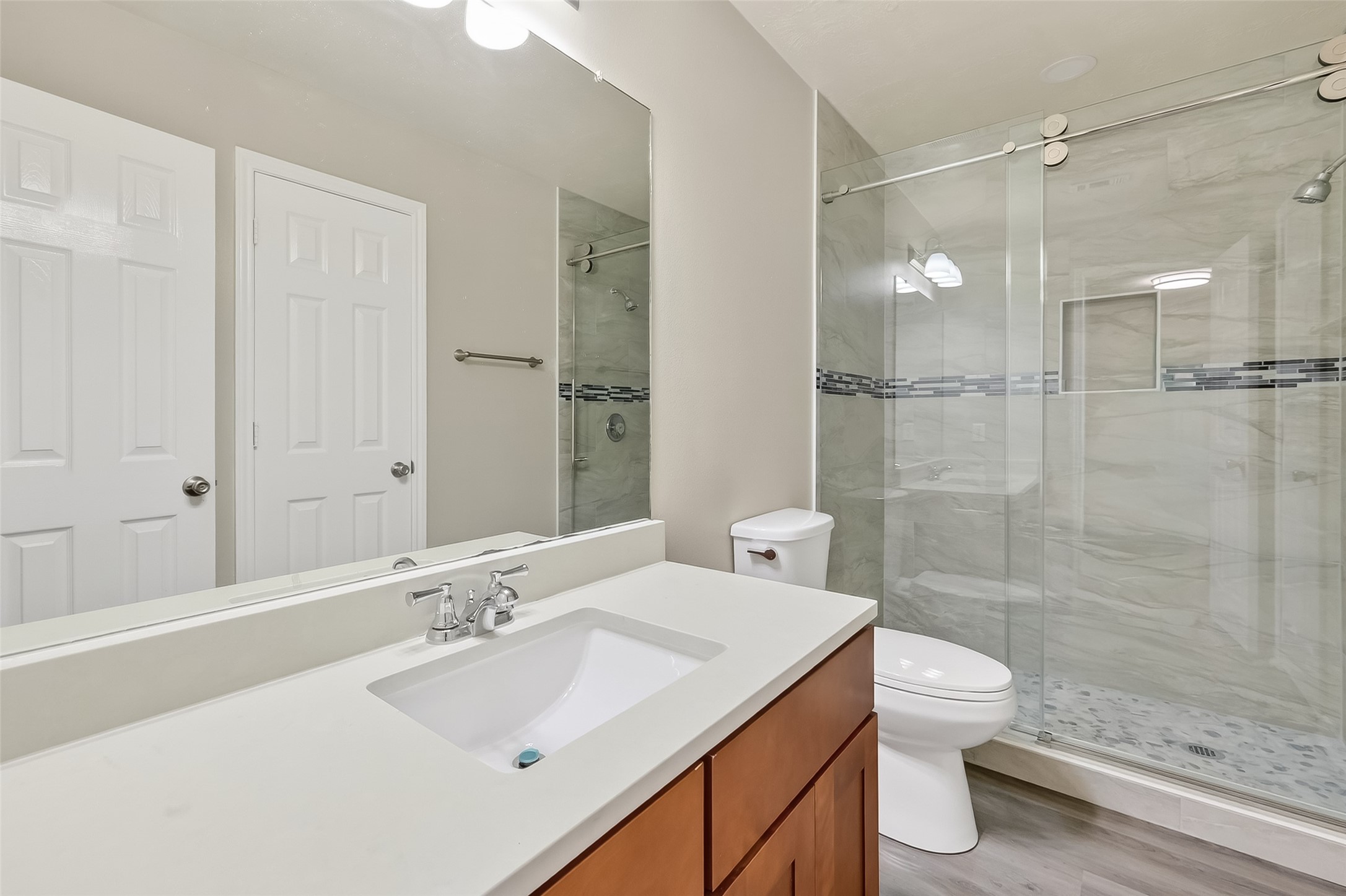 11735 Alief Clodine Road, Unit 36 Houston, TX 77072 - Photo 15 of 27 a bathroom with a sink toilet and shower