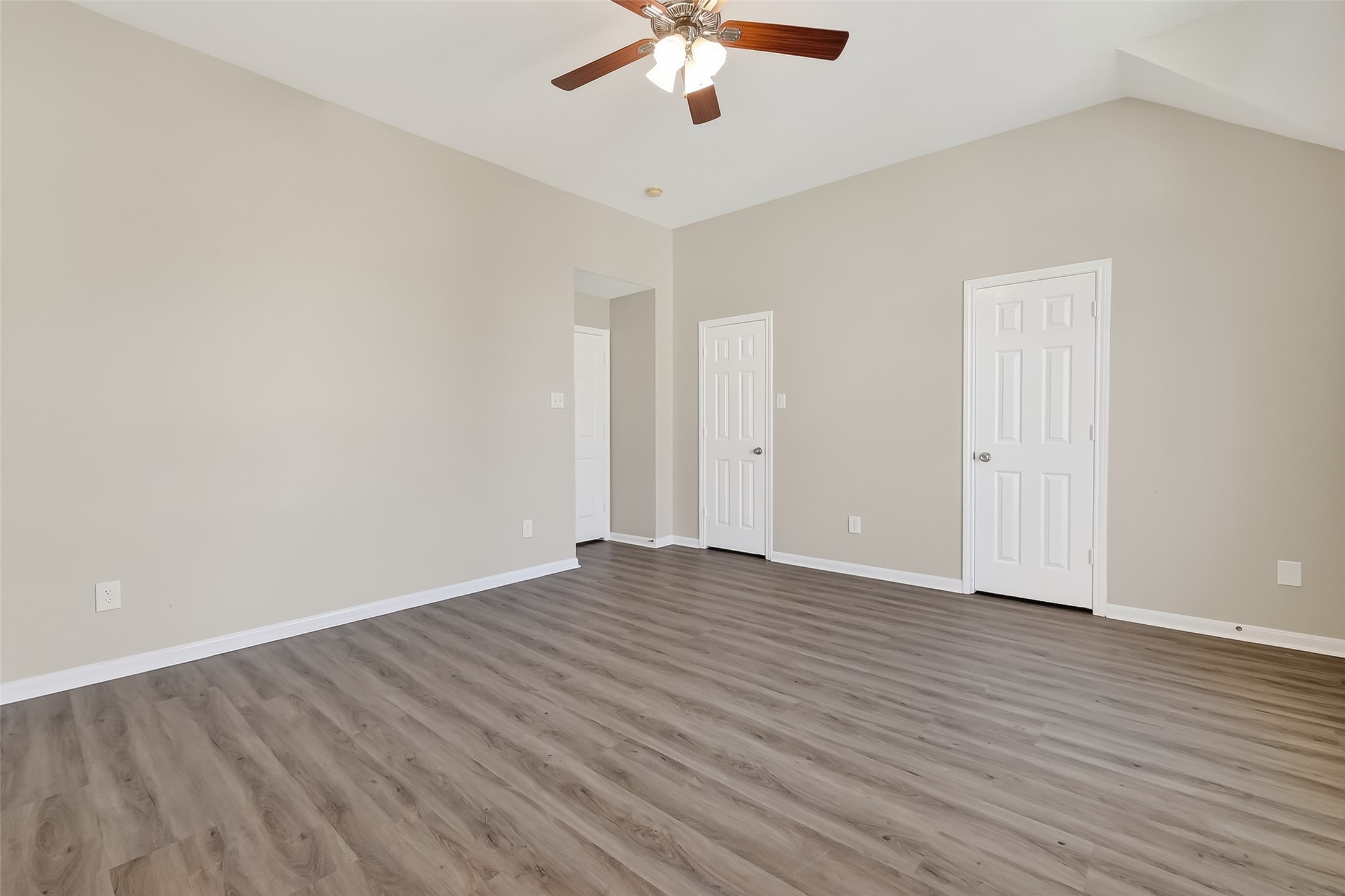 11735 Alief Clodine Road, Unit 36 Houston, TX 77072 - Photo 22 of 27 a view of an empty room with wooden floor