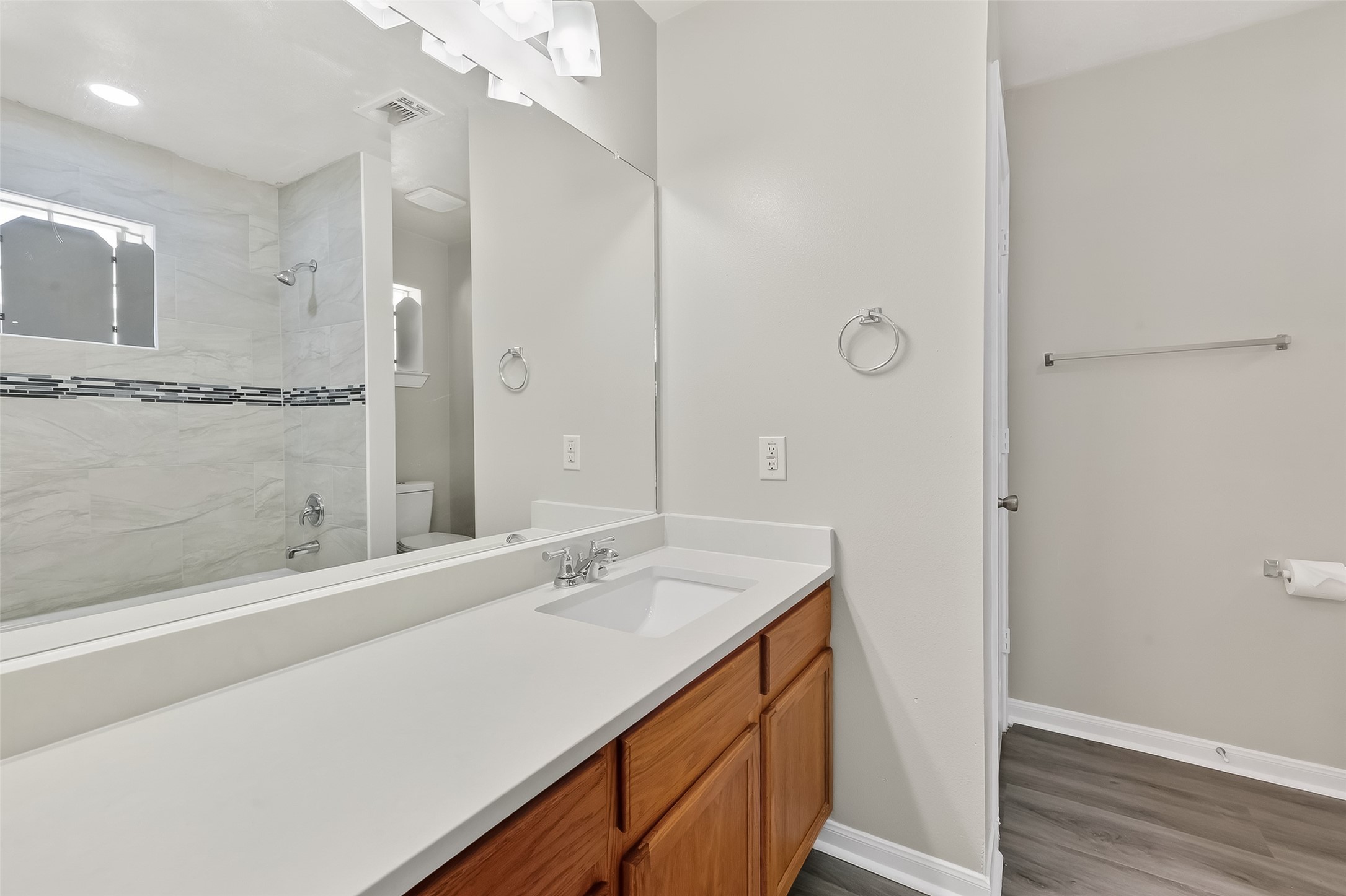 11735 Alief Clodine Road, Unit 36 Houston, TX 77072 - Photo 24 of 27 a bathroom with a double vanity sink mirror and shower