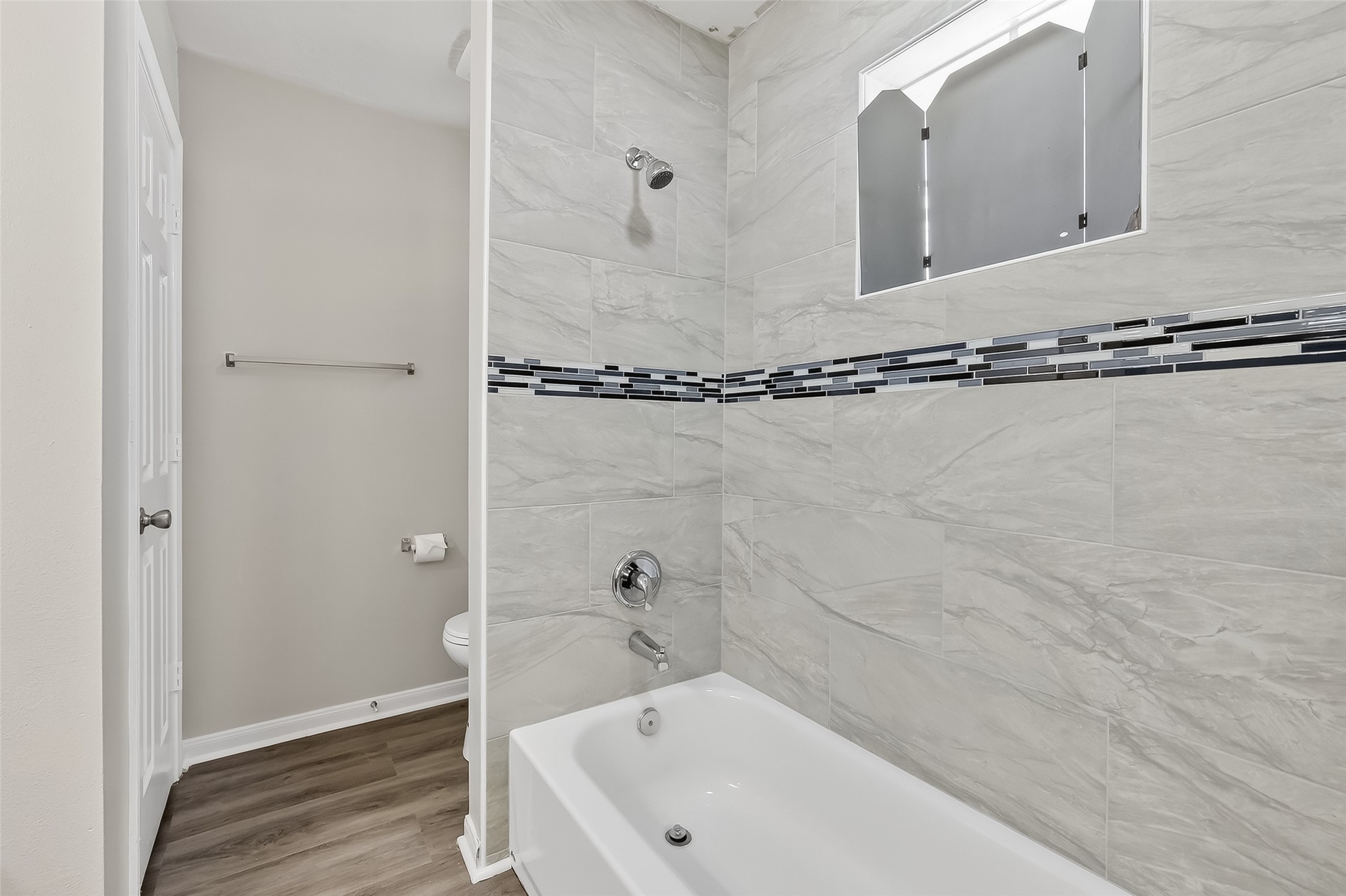 11735 Alief Clodine Road, Unit 36 Houston, TX 77072 - Photo 25 of 27 a bathroom with a tub and a shower
