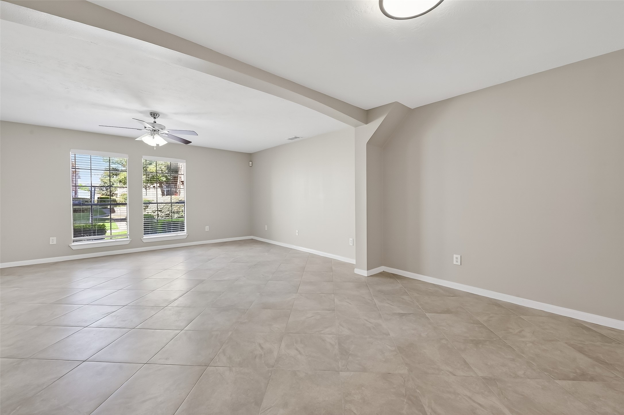 11735 Alief Clodine Road, Unit 36 Houston, TX 77072 - Photo 10 of 27 a view of an empty room with a window