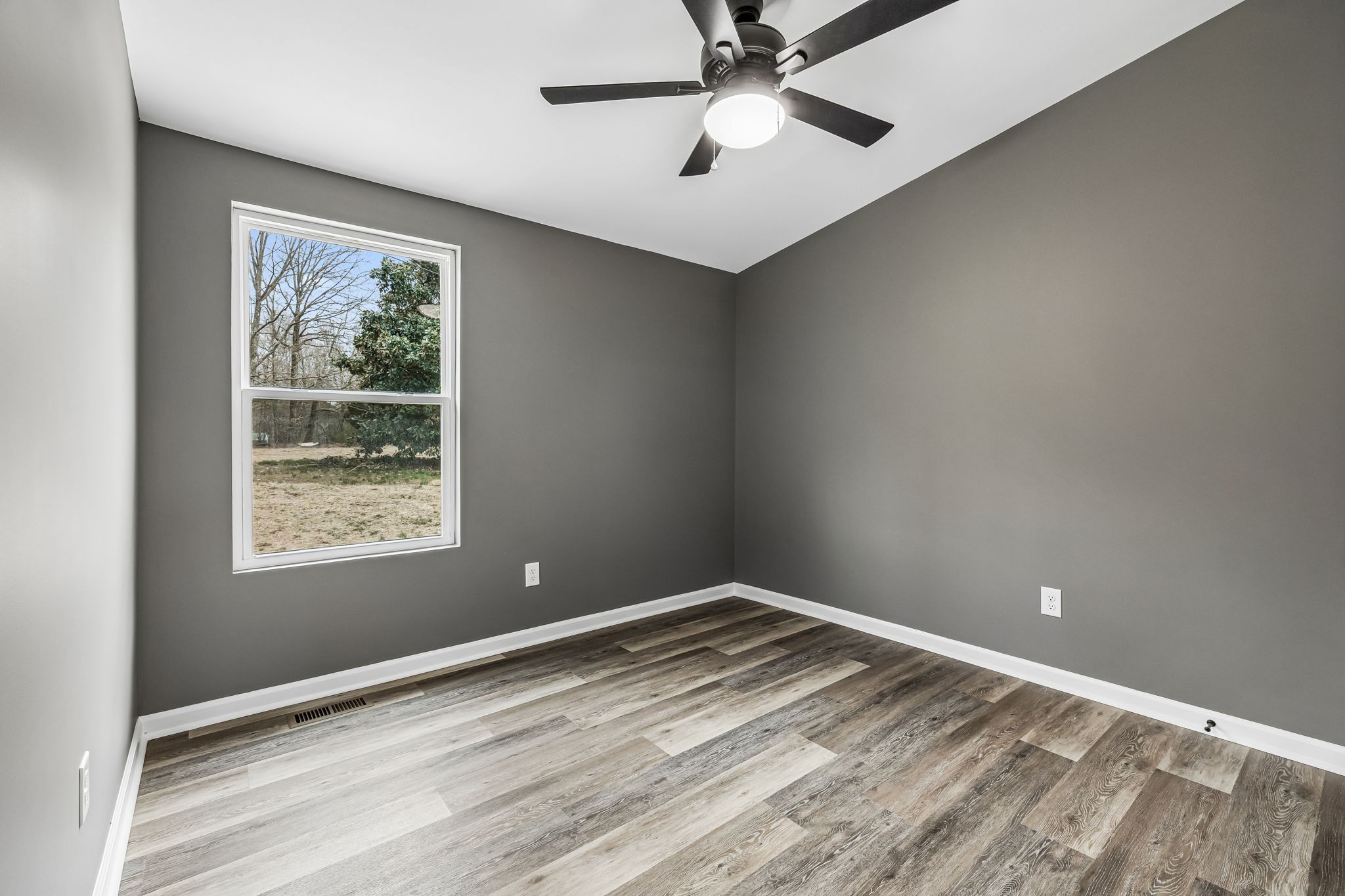 1985 Mosley Ferry Road Chapmansboro, TN 37035 - Photo 18 of 24 a view of an empty room with a window
