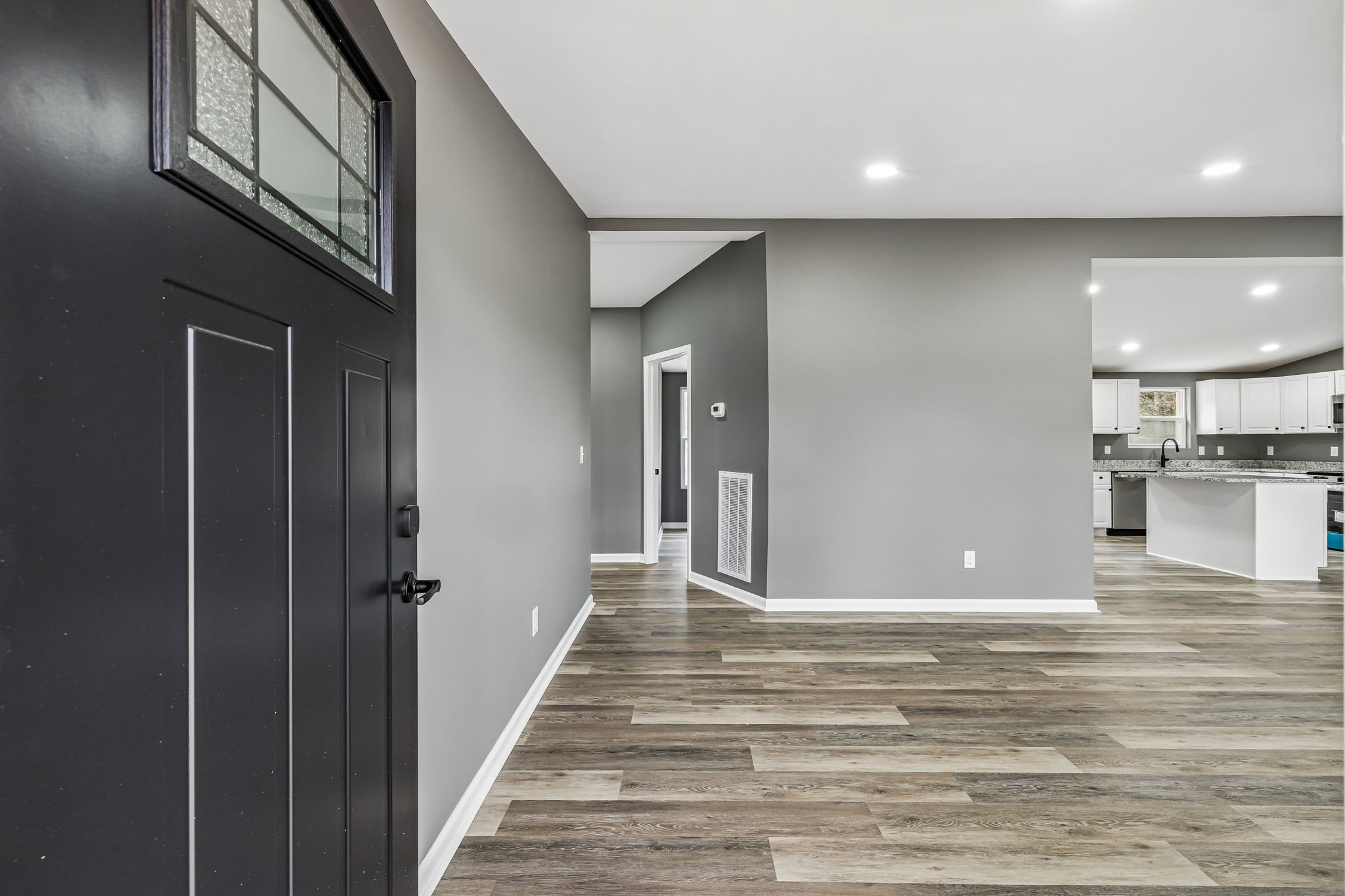 1985 Mosley Ferry Road Chapmansboro, TN 37035 - Photo 4 of 24 a view of a hallway with a kitchen