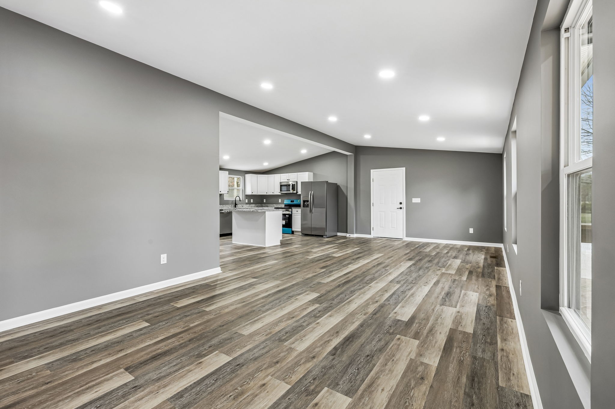 1985 Mosley Ferry Road Chapmansboro, TN 37035 - Photo 5 of 24 a view of a livingroom with wooden floor