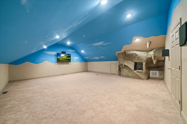 a view of balcony with wooden floor