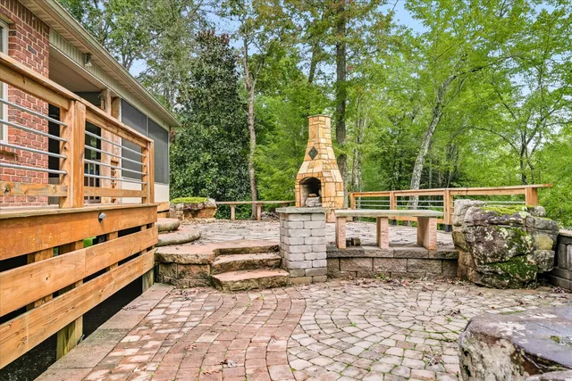 a view of a park with large trees