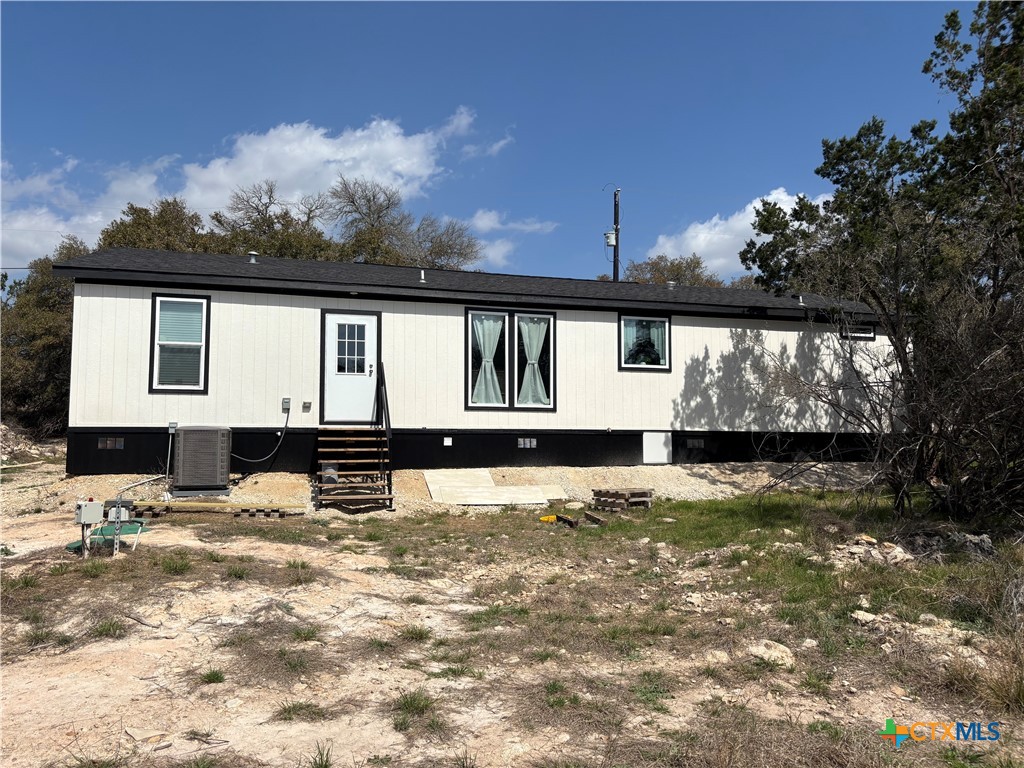 320 Fawn Drive Spring Branch, TX 78070 - Photo 2 of 16 a front view of a house with a yard