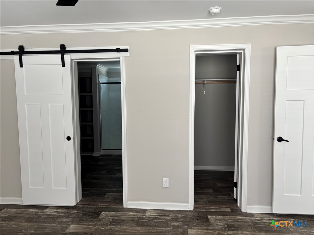 320 Fawn Drive Spring Branch, TX 78070 - Photo 8 of 16 a view of a hallway with wooden floor