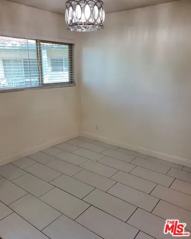 en empty room with windows