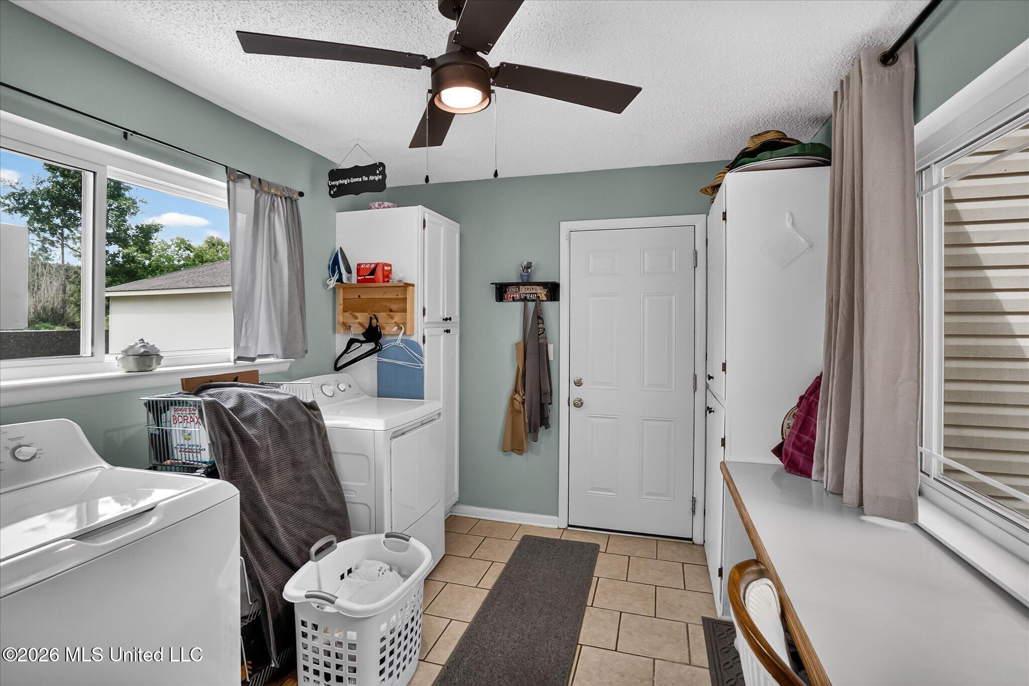 9211 Pointe Aux Chenes Road Ocean Springs, MS 39564 - Photo 24 of 57 Laundry / Utility room