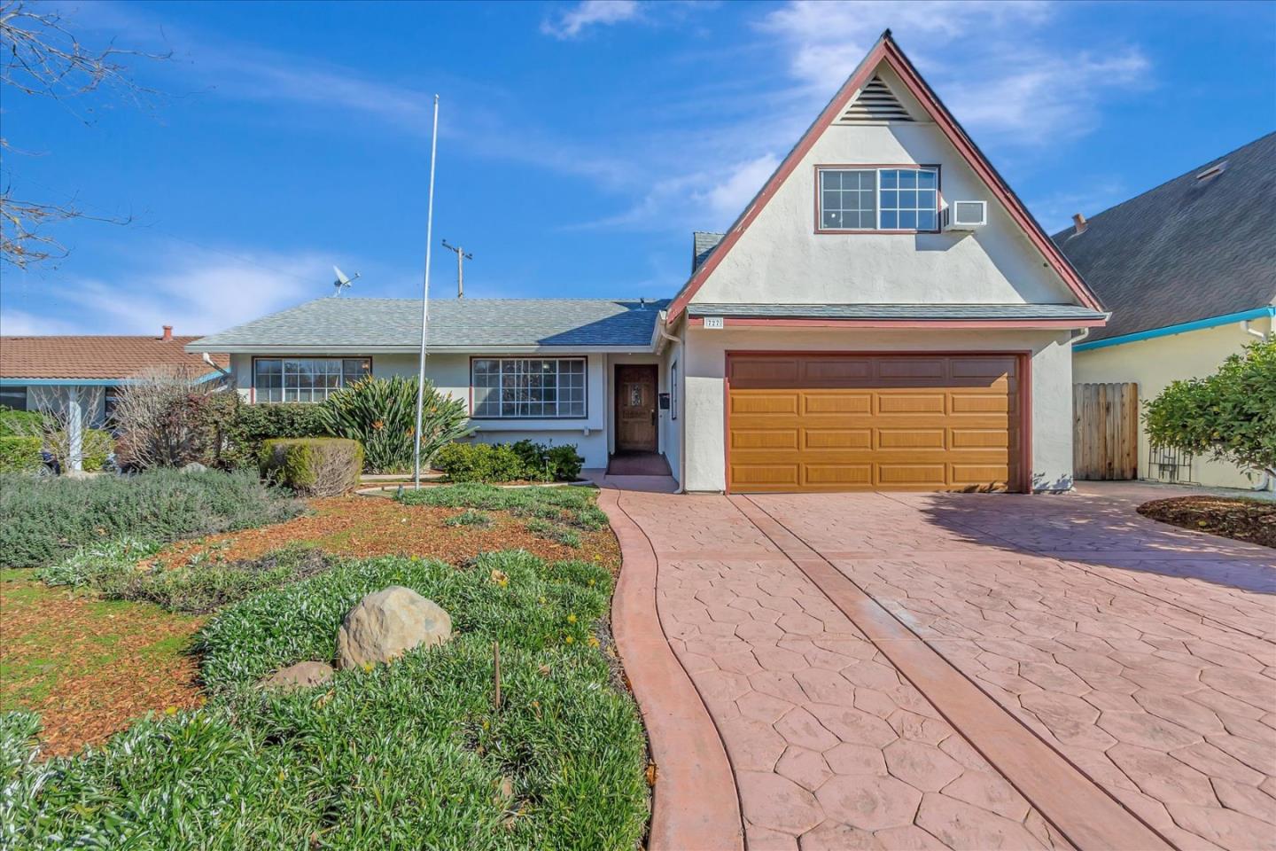 727 Valley Way Santa Clara, CA 95051 - Photo 1 of 52 a front view of a house with garden