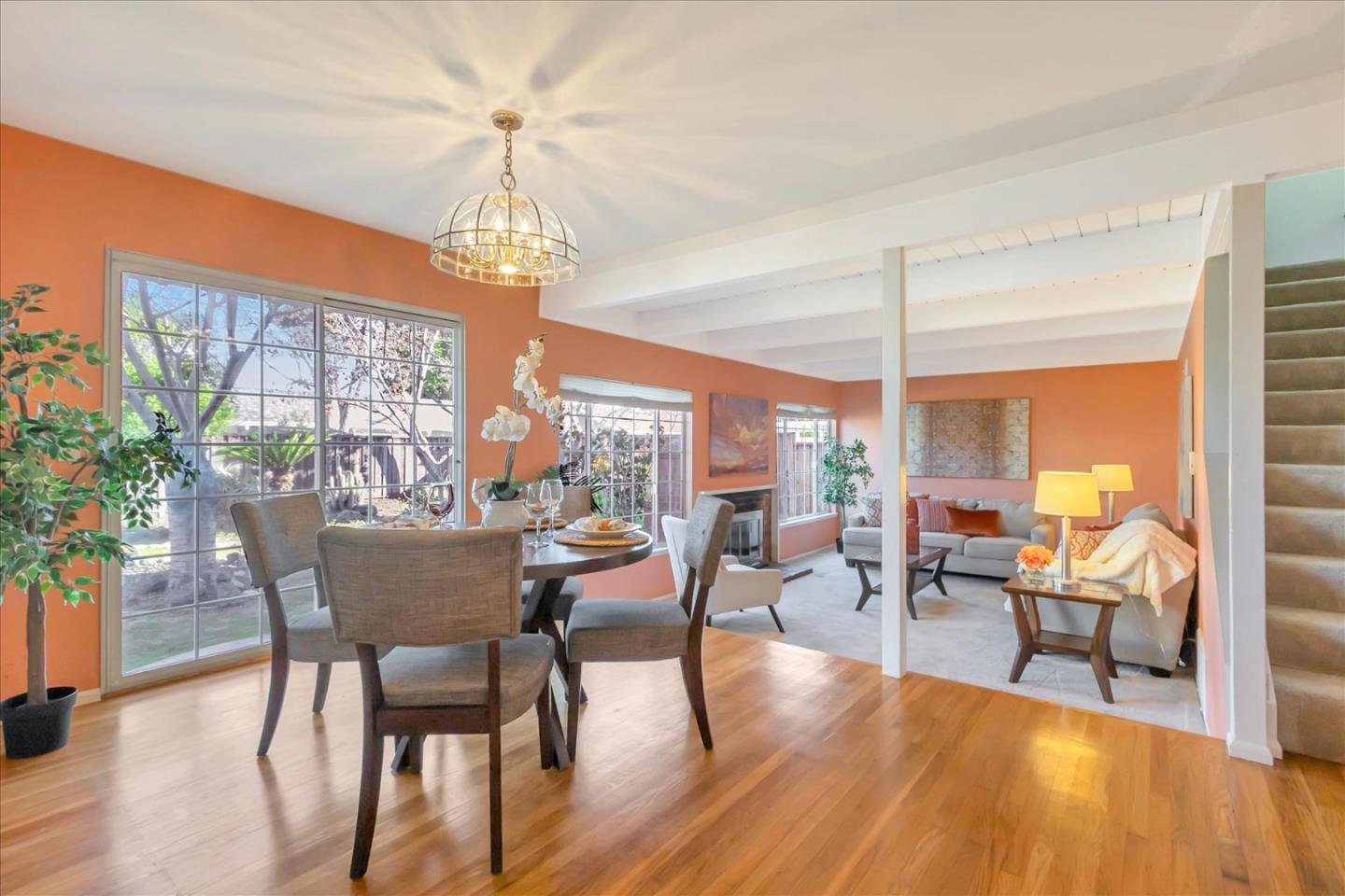 727 Valley Way Santa Clara, CA 95051 - Photo 20 of 52 a view of a dining room with furniture window and wooden floor