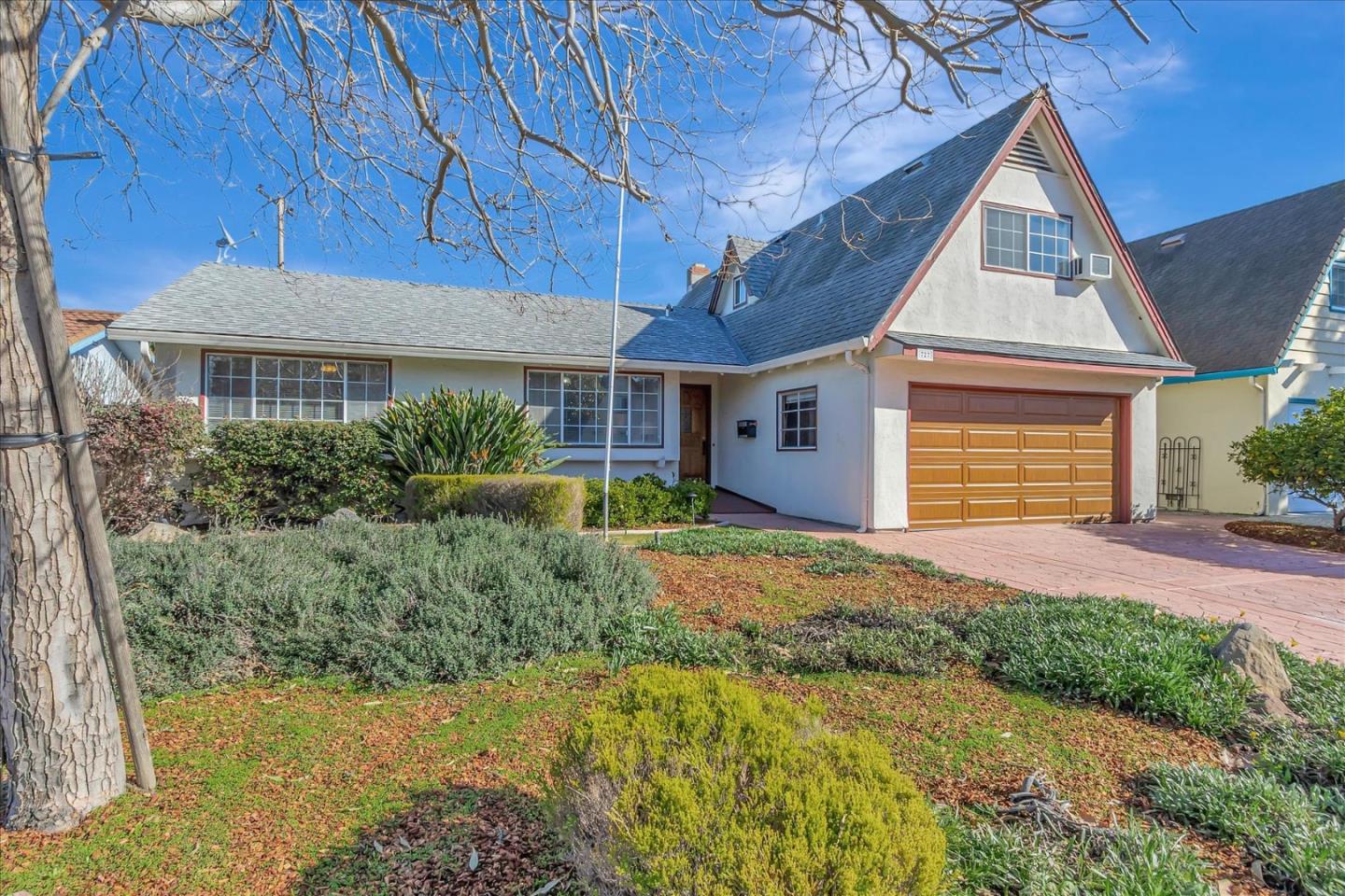 727 Valley Way Santa Clara, CA 95051 - Photo 2 of 52 a front view of a house with garden