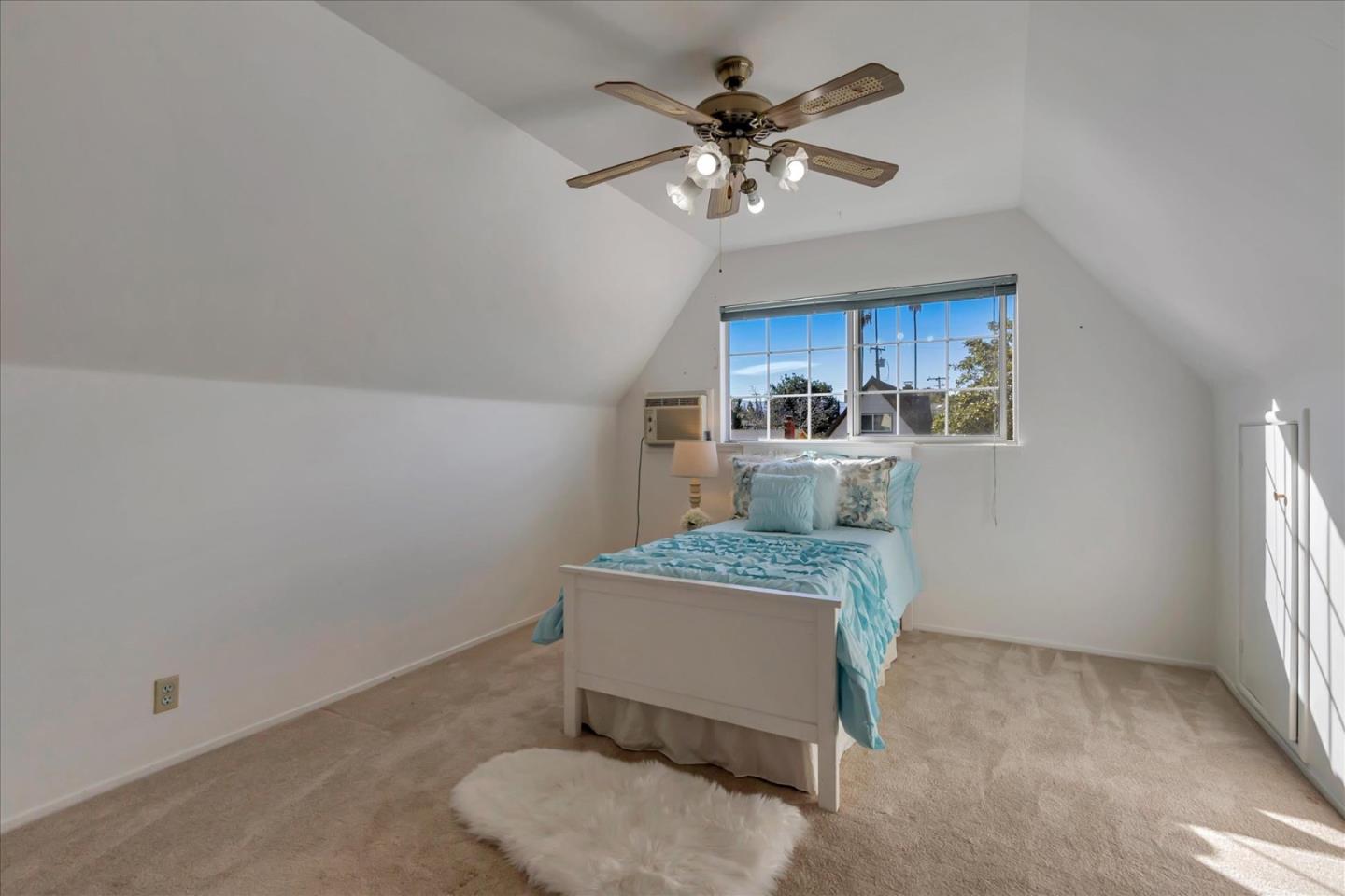 727 Valley Way Santa Clara, CA 95051 - Photo 31 of 52 a dining room with a table chairs and kitchen view