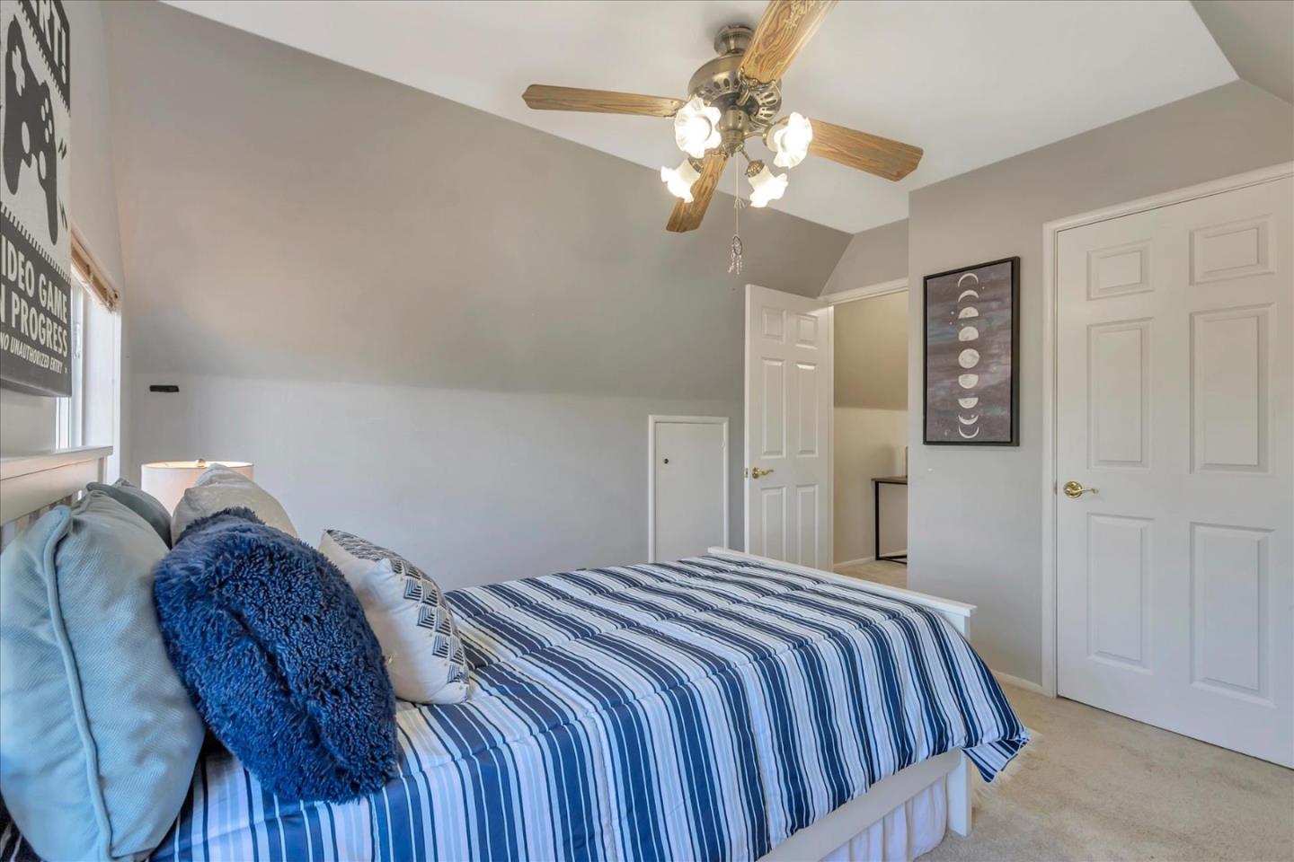 727 Valley Way Santa Clara, CA 95051 - Photo 32 of 52 a bedroom with a bed and wooden floor