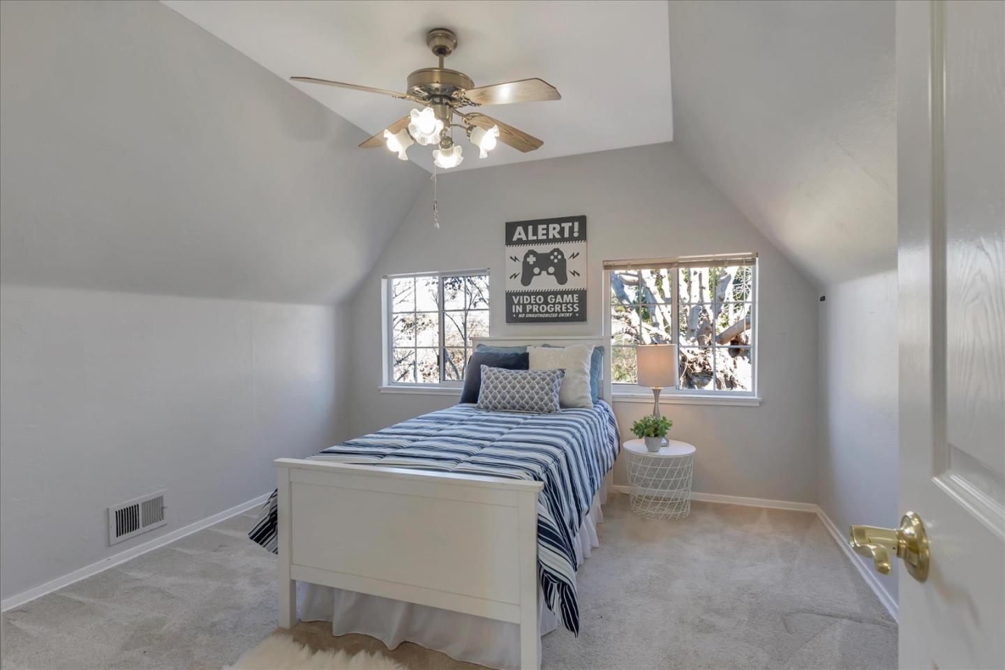 727 Valley Way Santa Clara, CA 95051 - Photo 33 of 52 a bedroom with a bed and a window