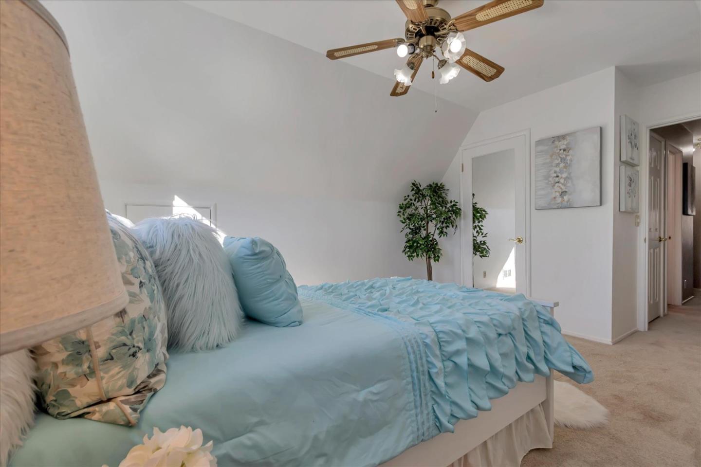 727 Valley Way Santa Clara, CA 95051 - Photo 36 of 52 a bedroom with a bed and ceiling fan
