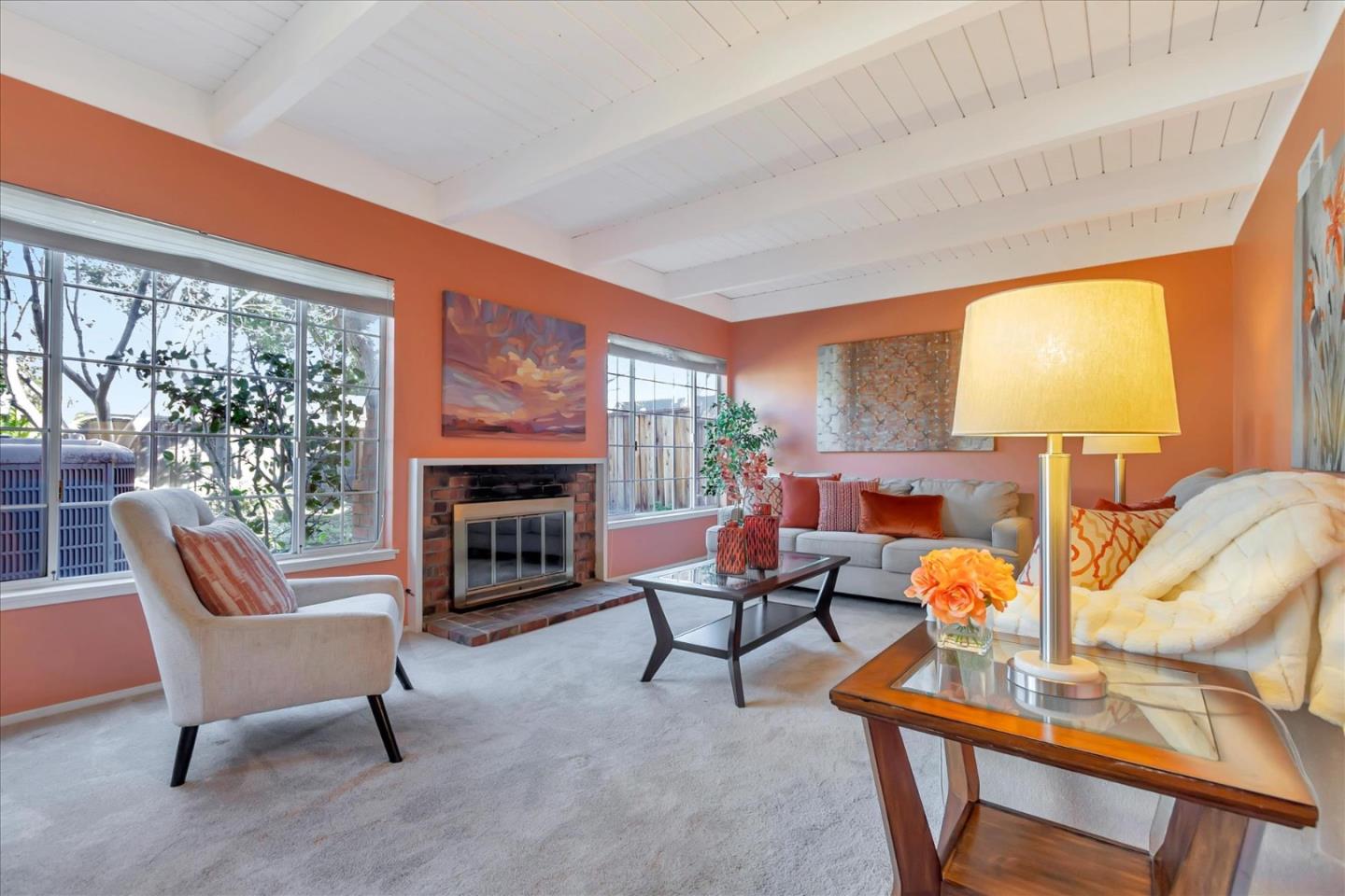 727 Valley Way Santa Clara, CA 95051 - Photo 5 of 52 a living room with furniture a fireplace and a large window